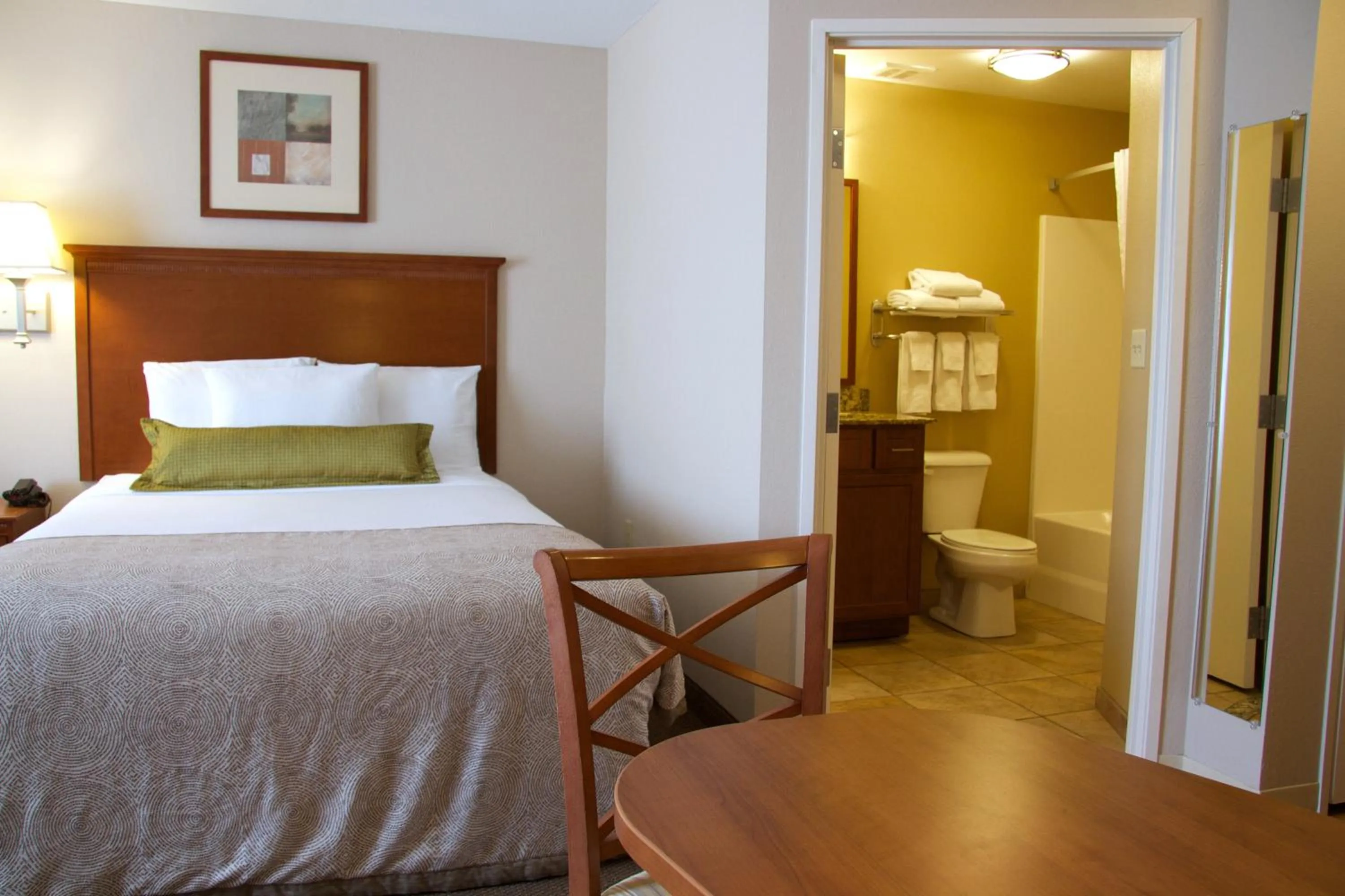 Photo of the whole room, Bed in Candlewood Suites Champaign-Urbana University Area by IHG
