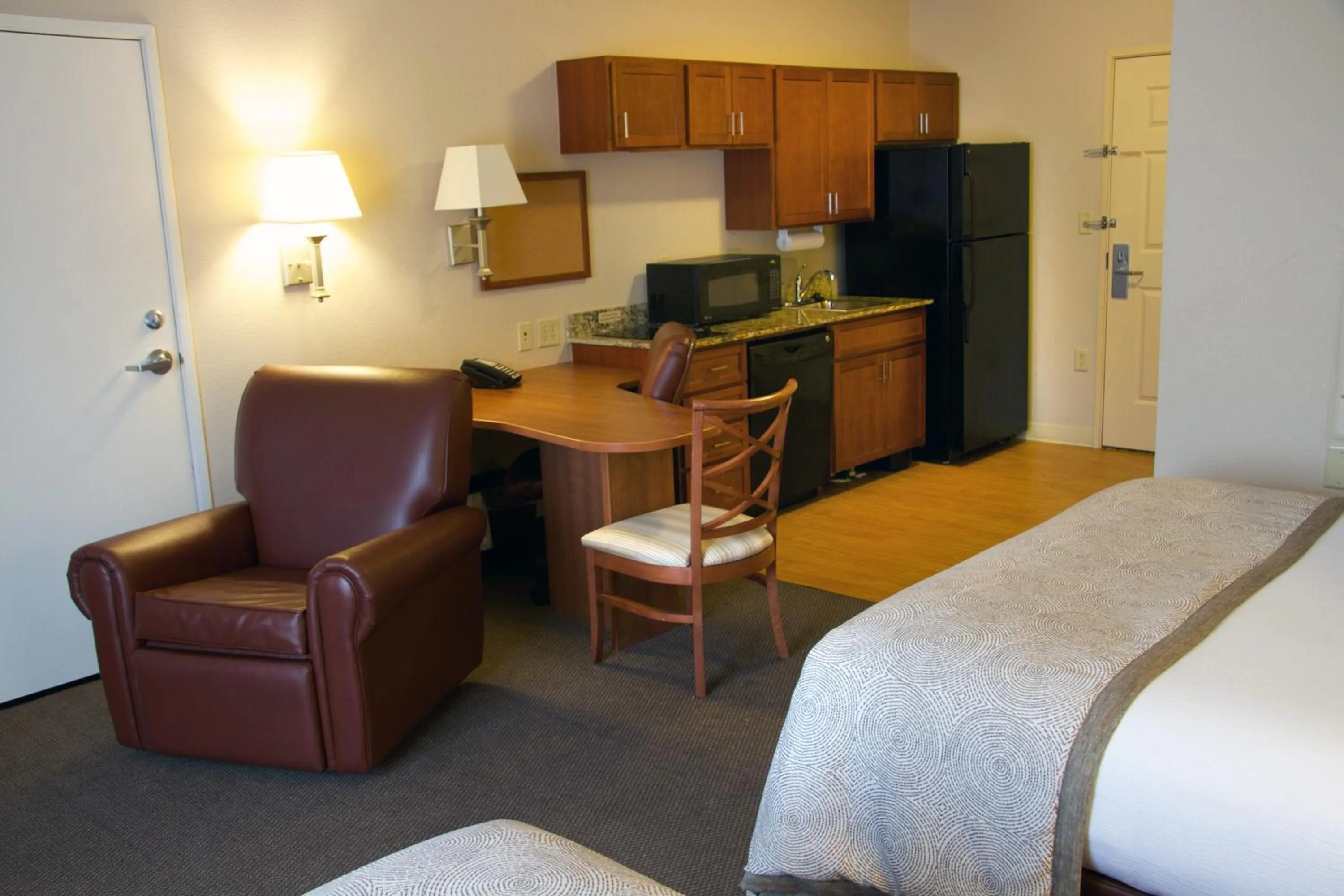 Photo of the whole room, Bed in Candlewood Suites Champaign-Urbana University Area by IHG