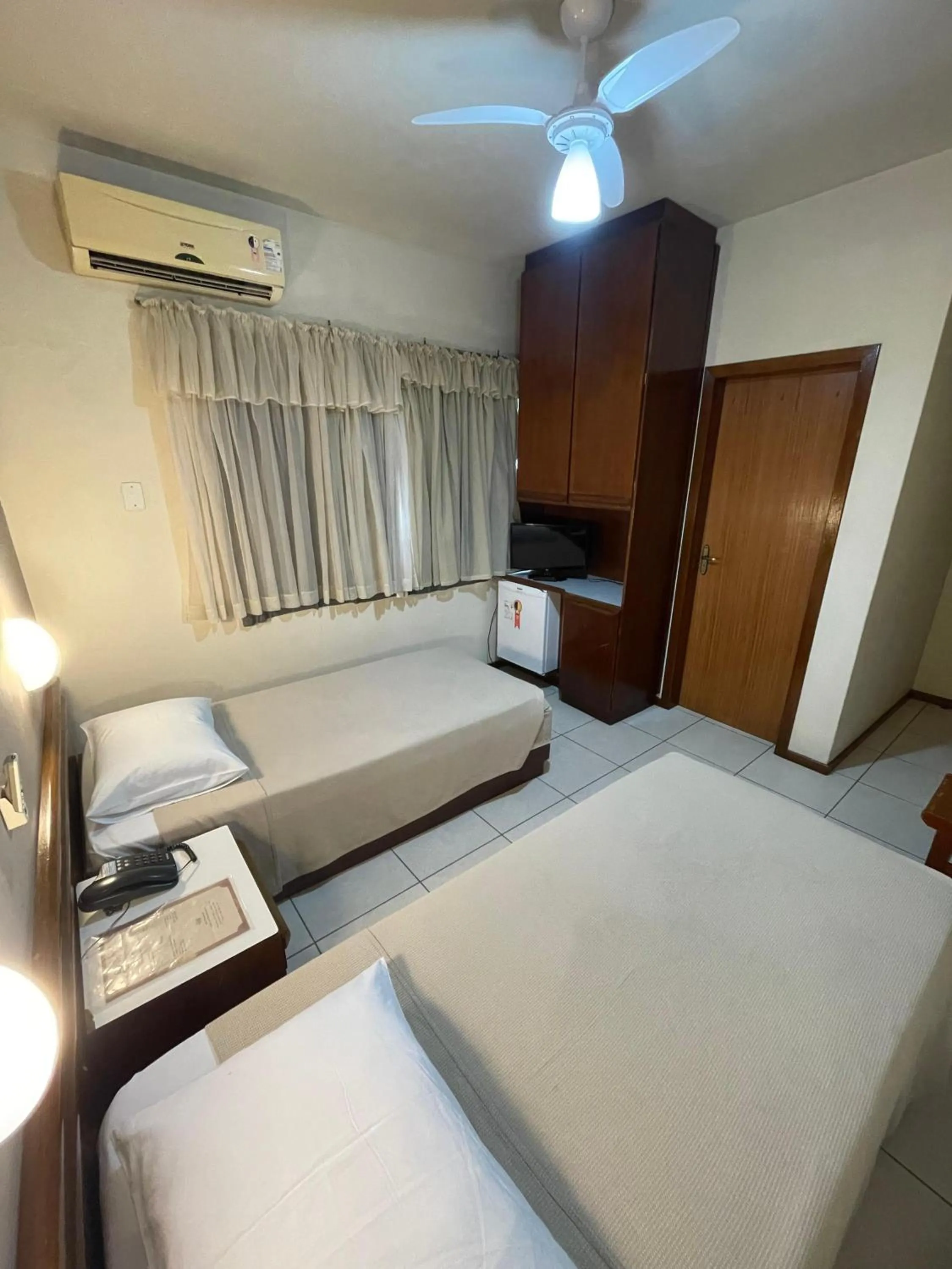 Bed in Hotel Cambirela