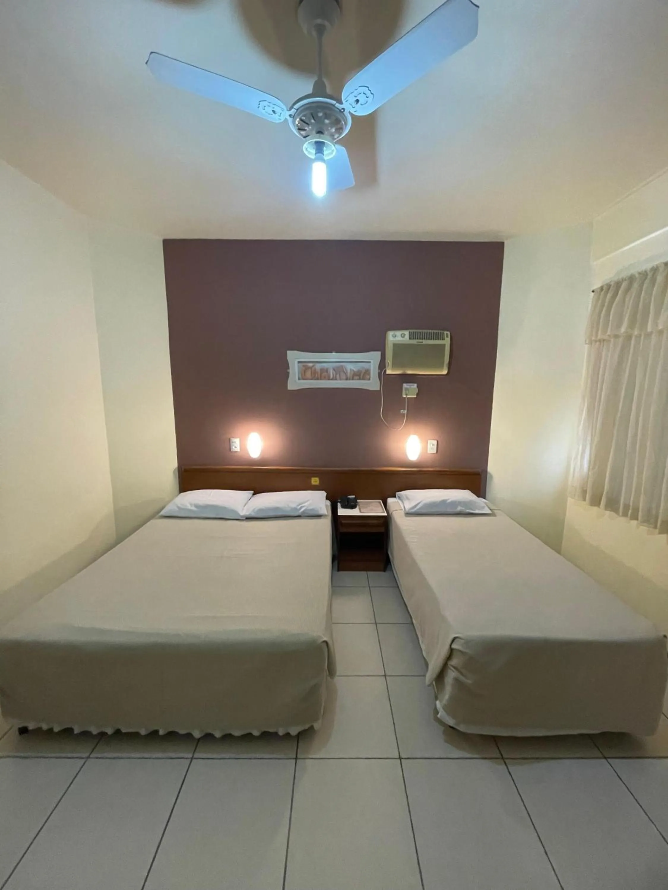 Bed in Hotel Cambirela