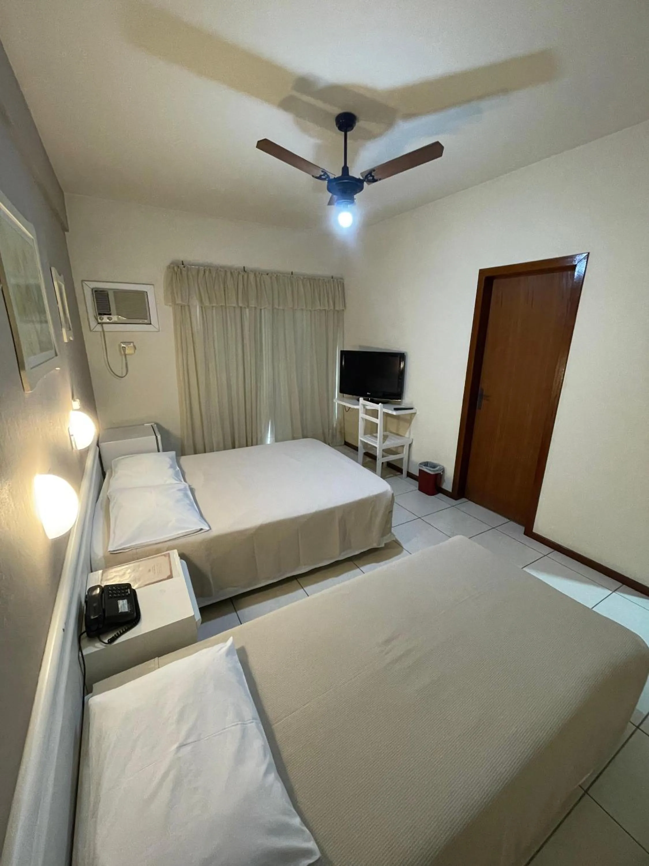 Bed in Hotel Cambirela