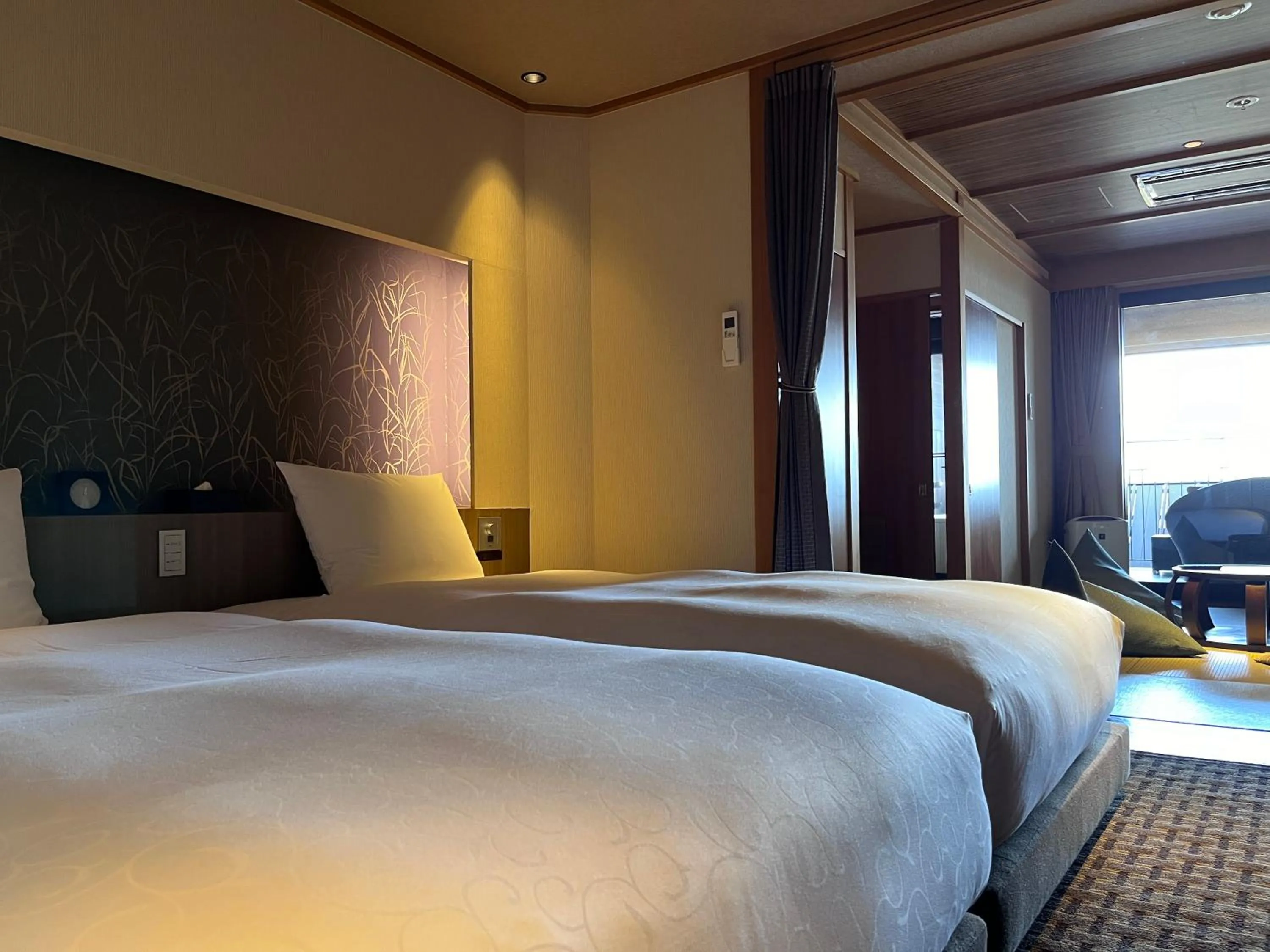 Bed in Laforet Shuzenji Sanshisuimei