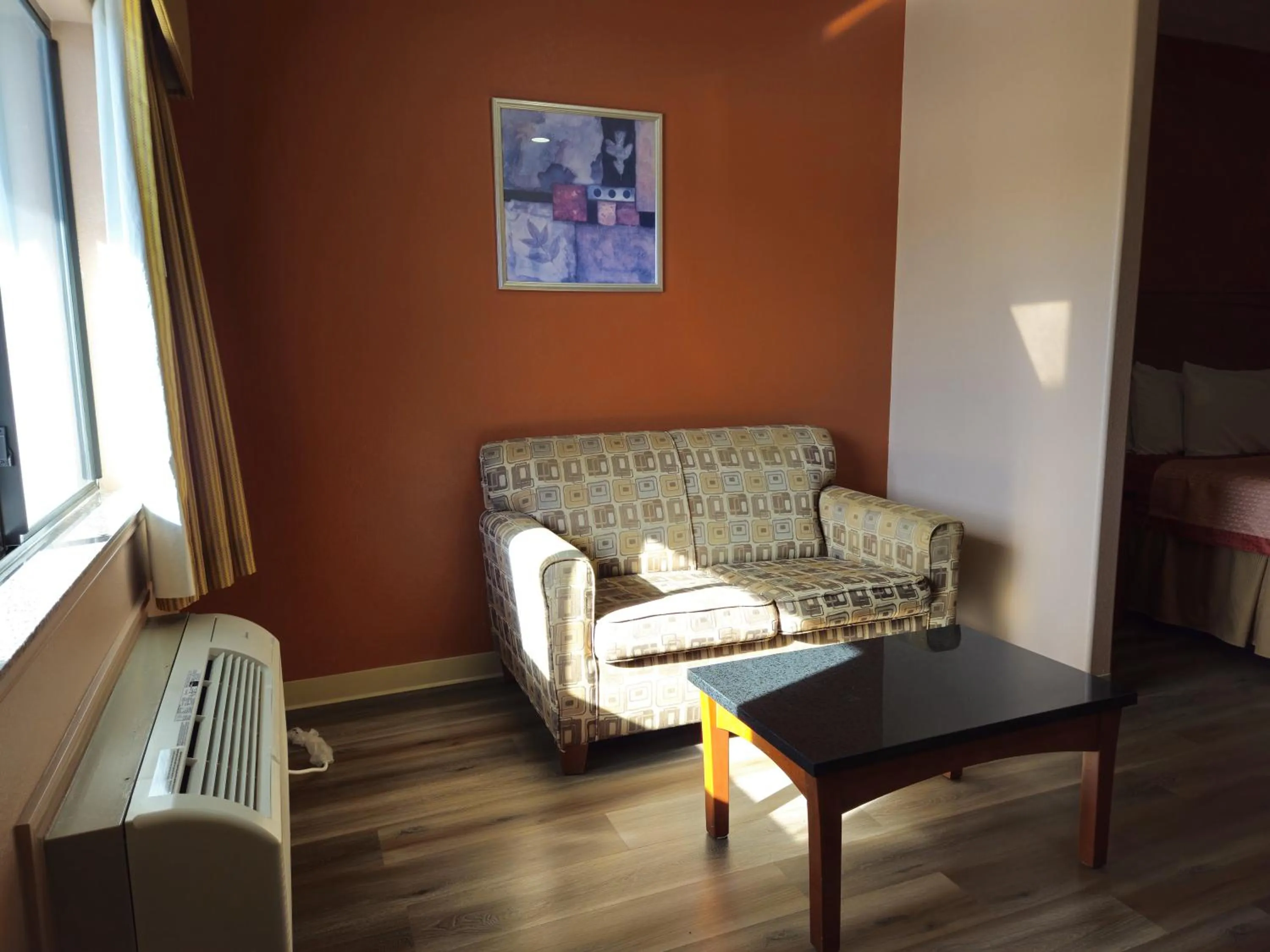 Living room in Budgetel Inn and Suites