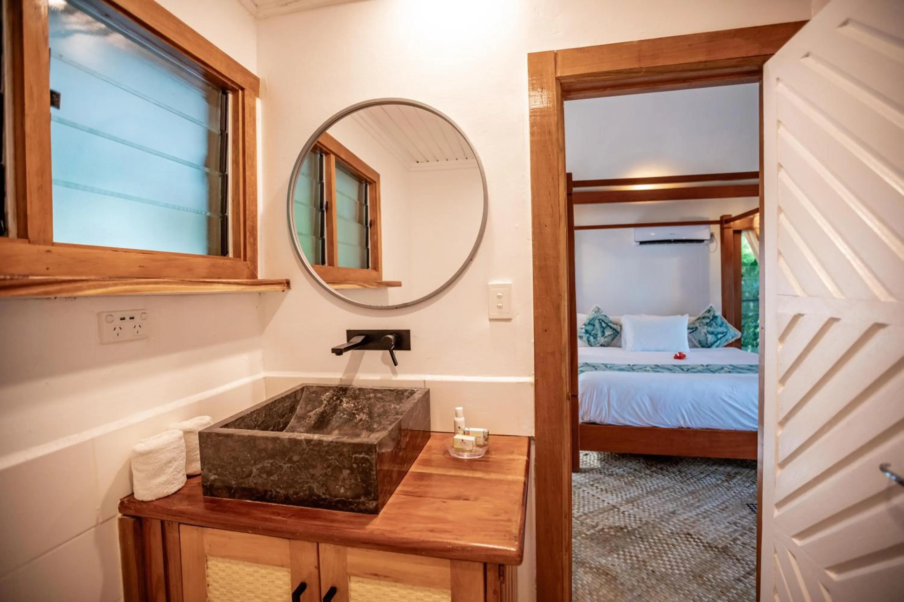 Bed in Koro Sun Resort & Rainforest Spa