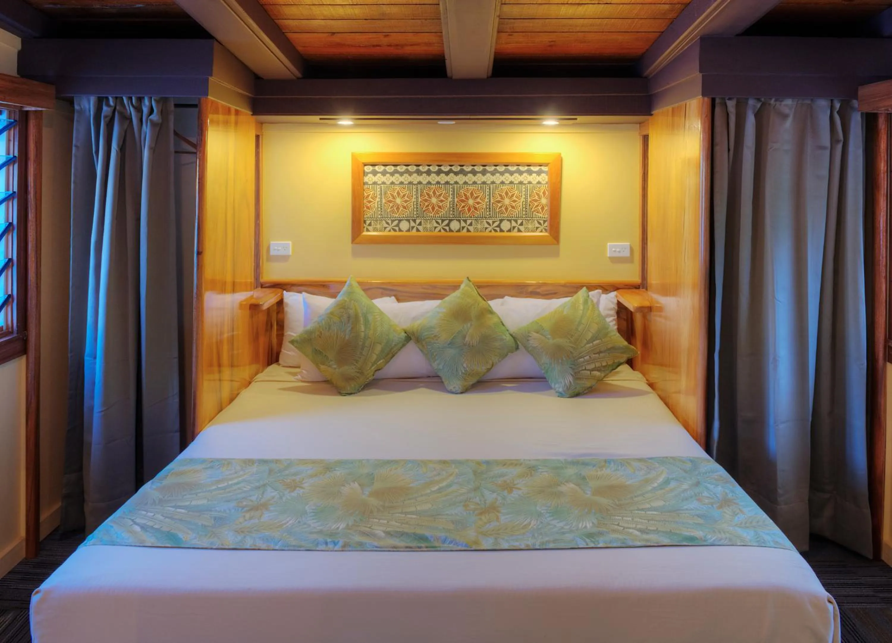 Bed in Koro Sun Resort & Rainforest Spa