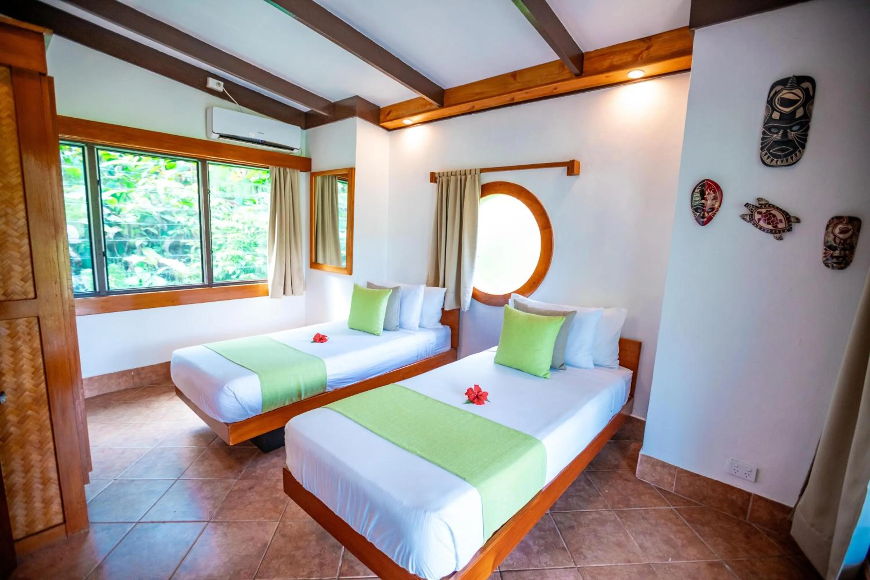 Bed in Koro Sun Resort & Rainforest Spa