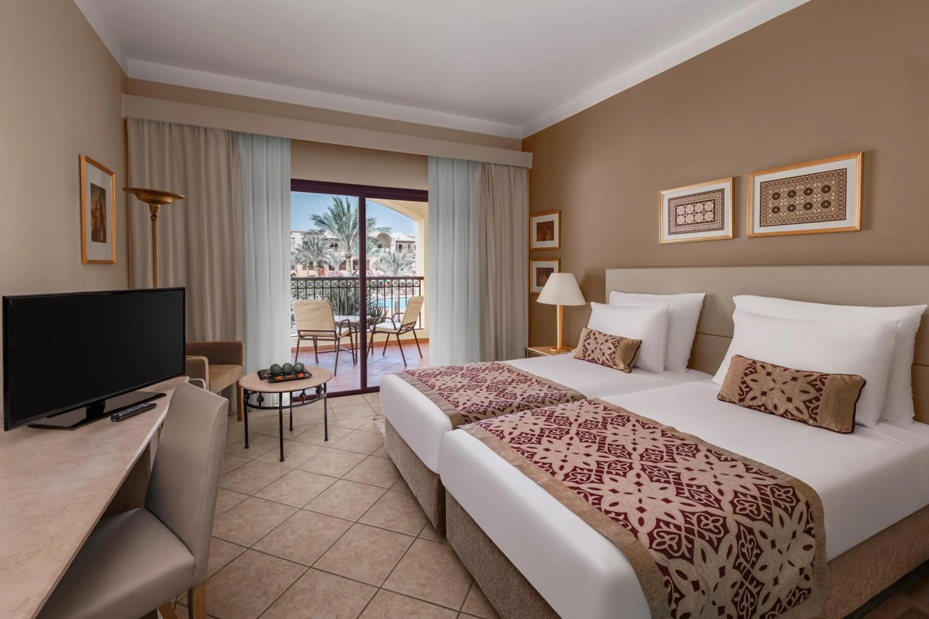 Photo of the whole room, Bed in JAZ Makadi Saraya Resort