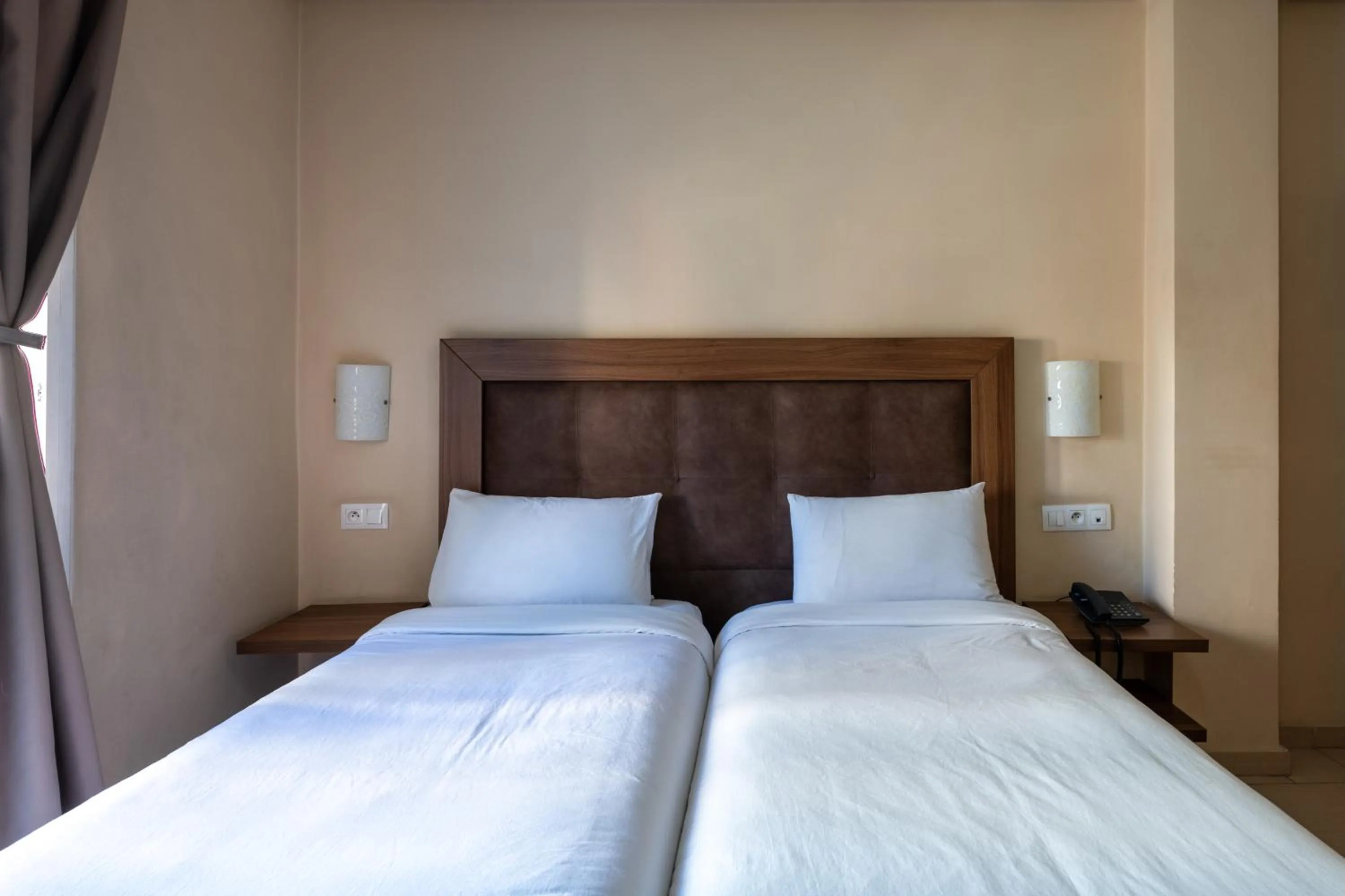 Bed in Hotel Etoile Du Nord