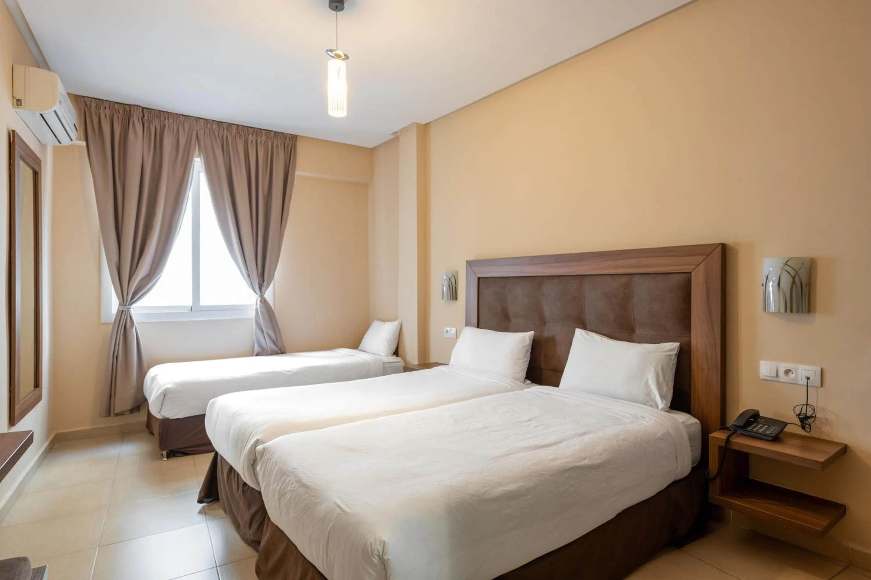 Bed in Hotel Etoile Du Nord