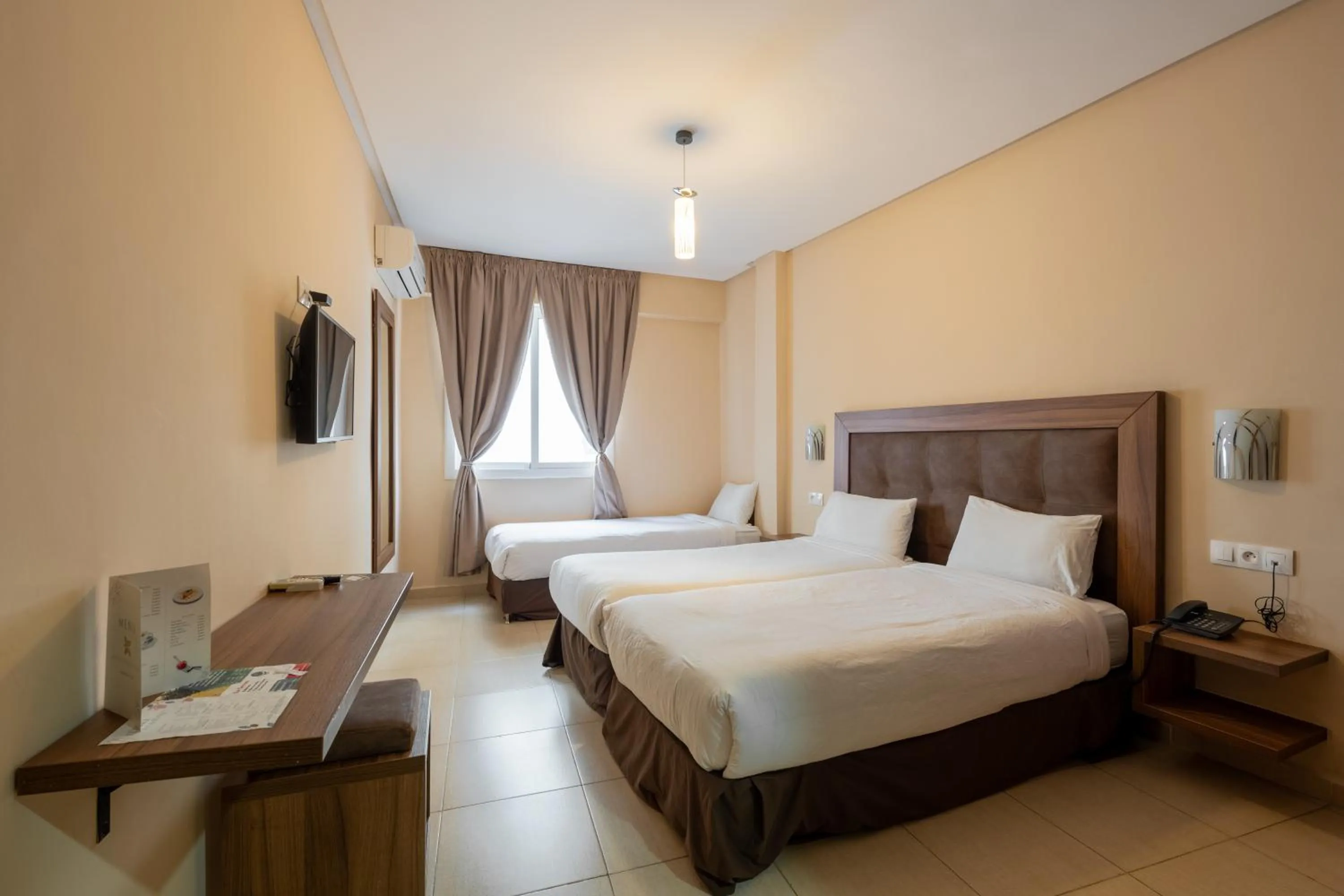 Bed in Hotel Etoile Du Nord