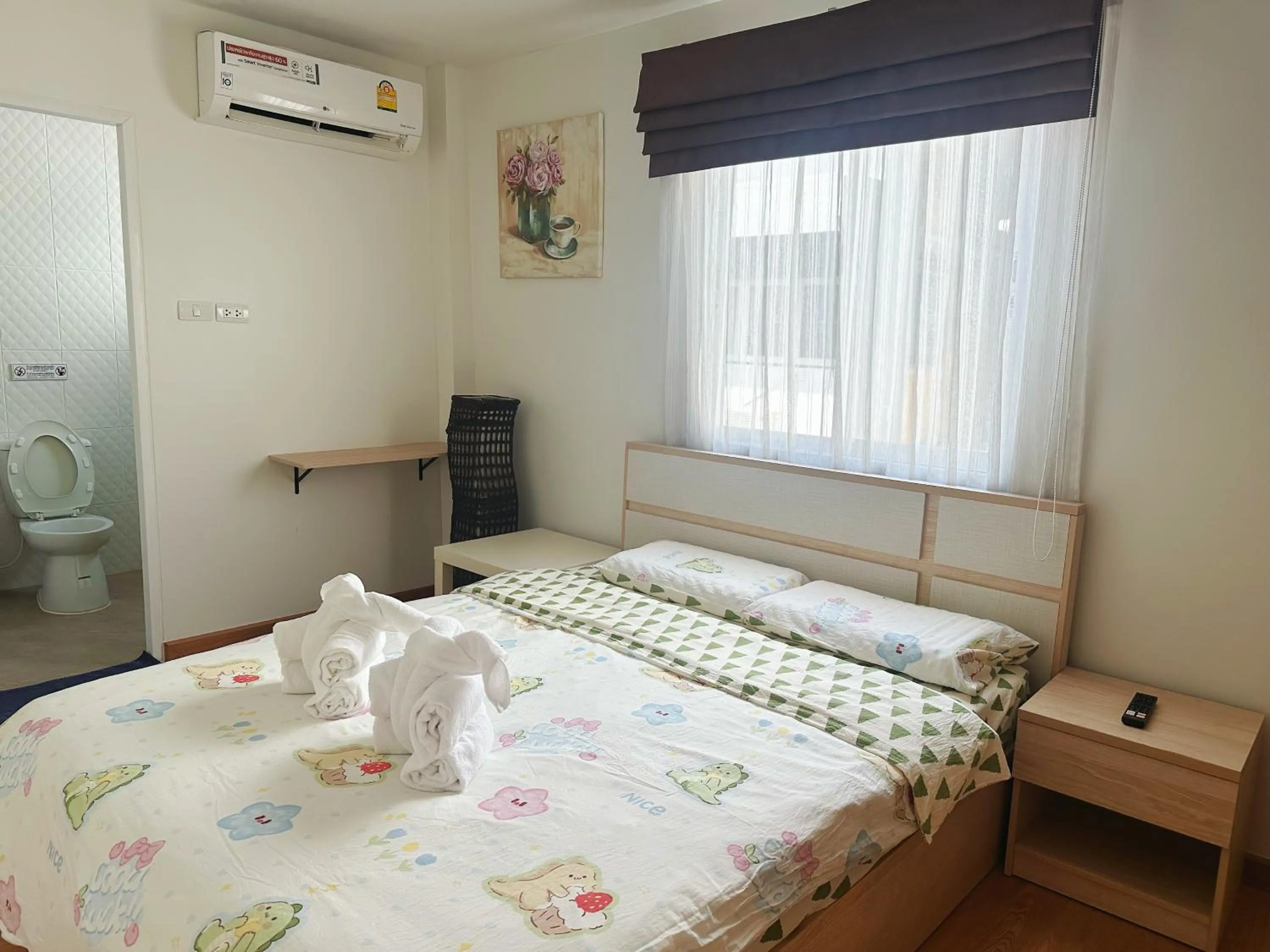 Photo of the whole room, Bed in TD Bangkok