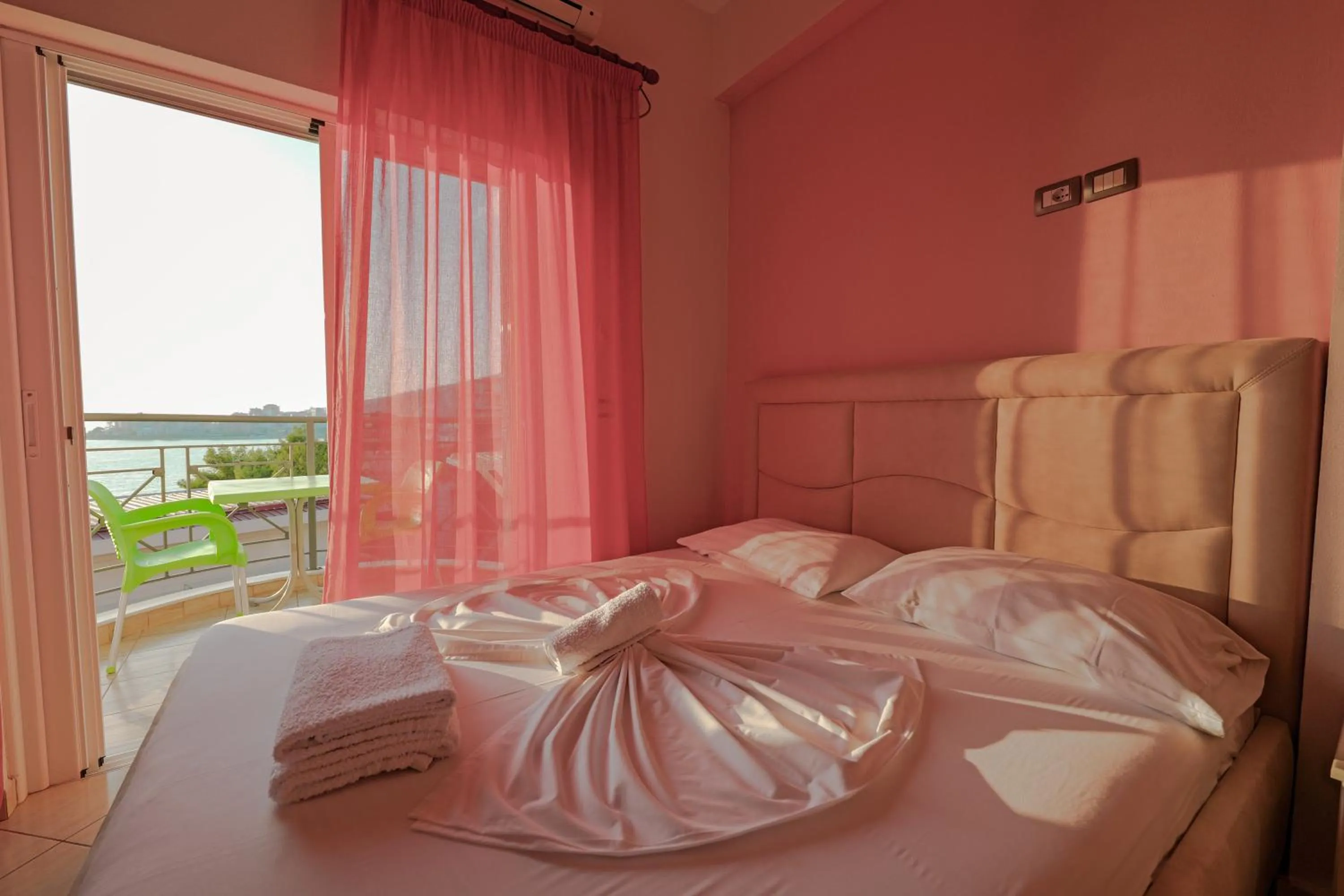 Bed in Unico ApartHotel