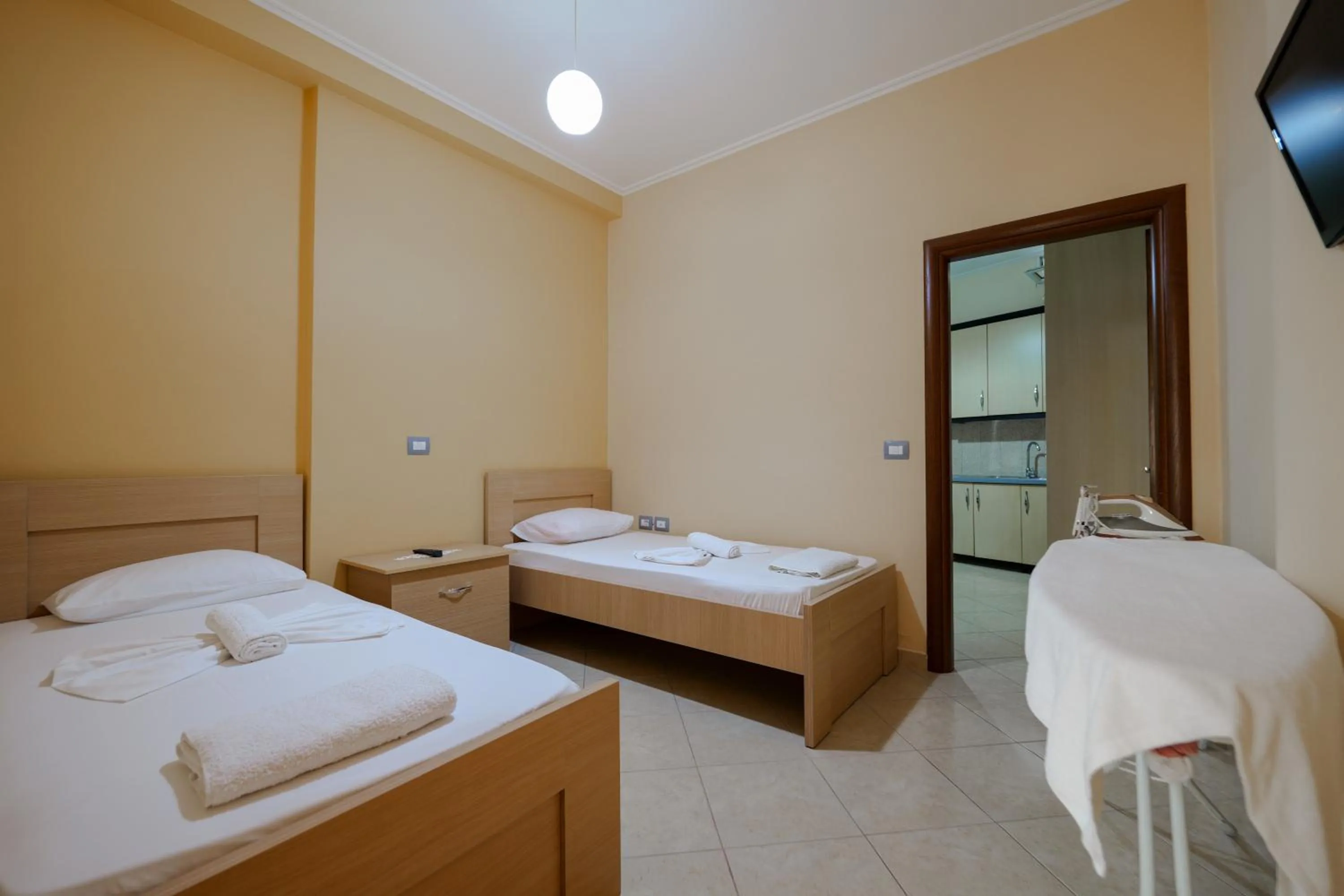 Bed in Unico ApartHotel