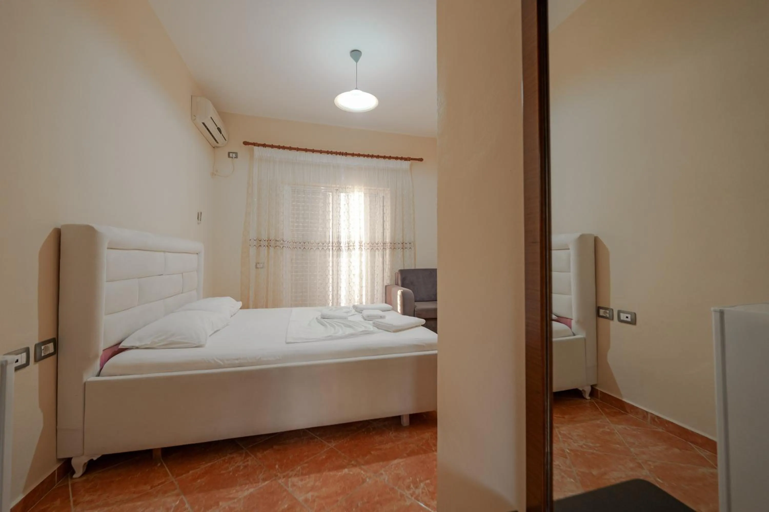 Bed in Unico ApartHotel