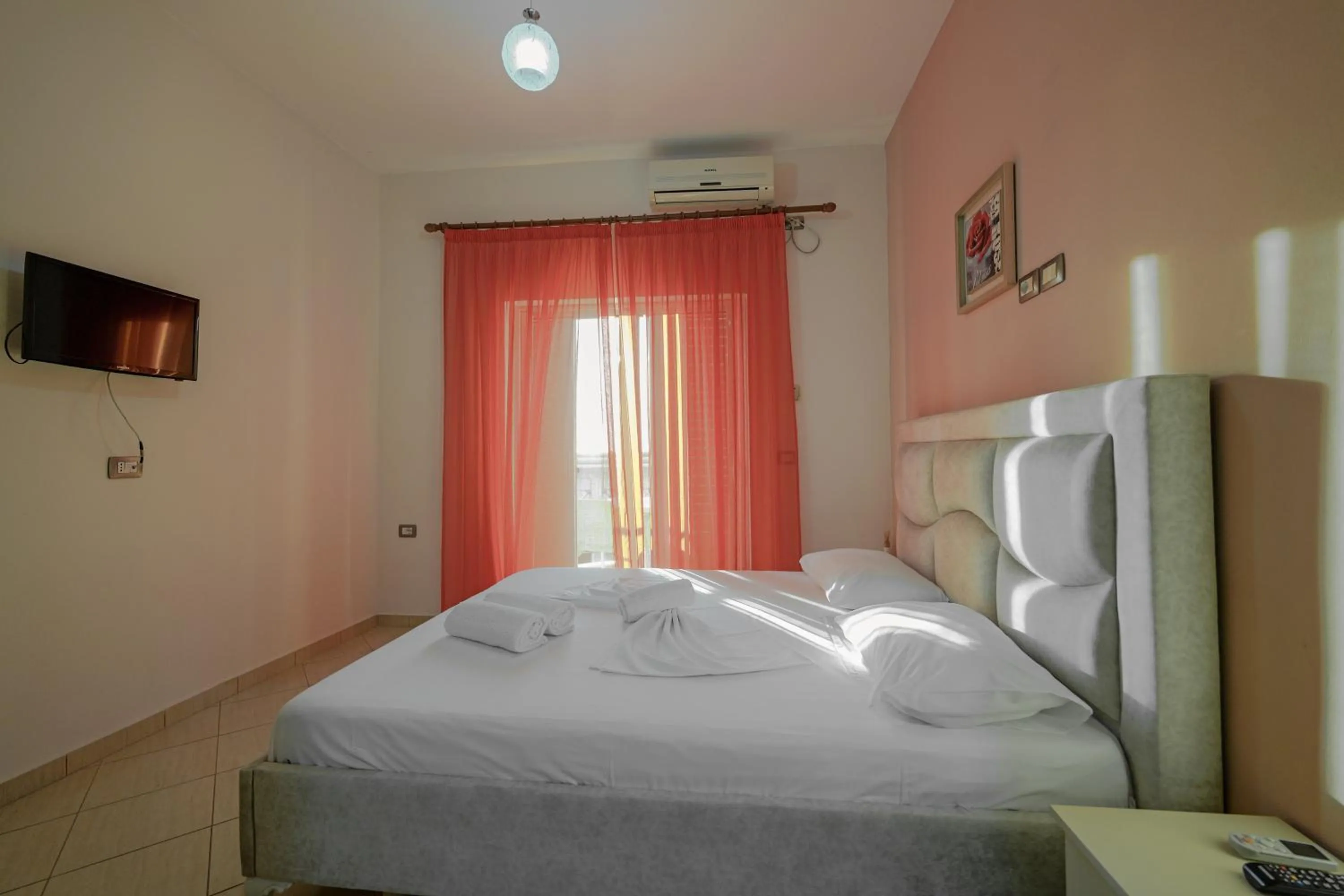 Bed in Unico ApartHotel