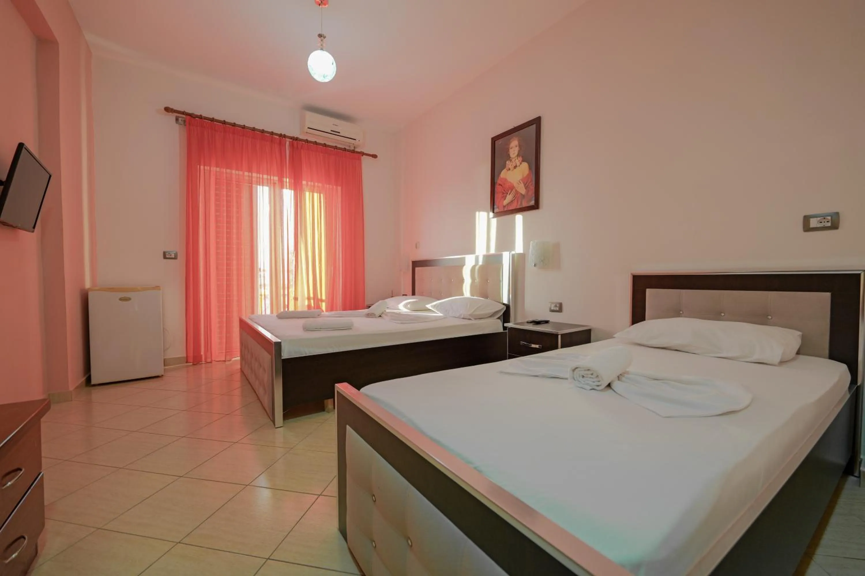 Bed in Unico ApartHotel