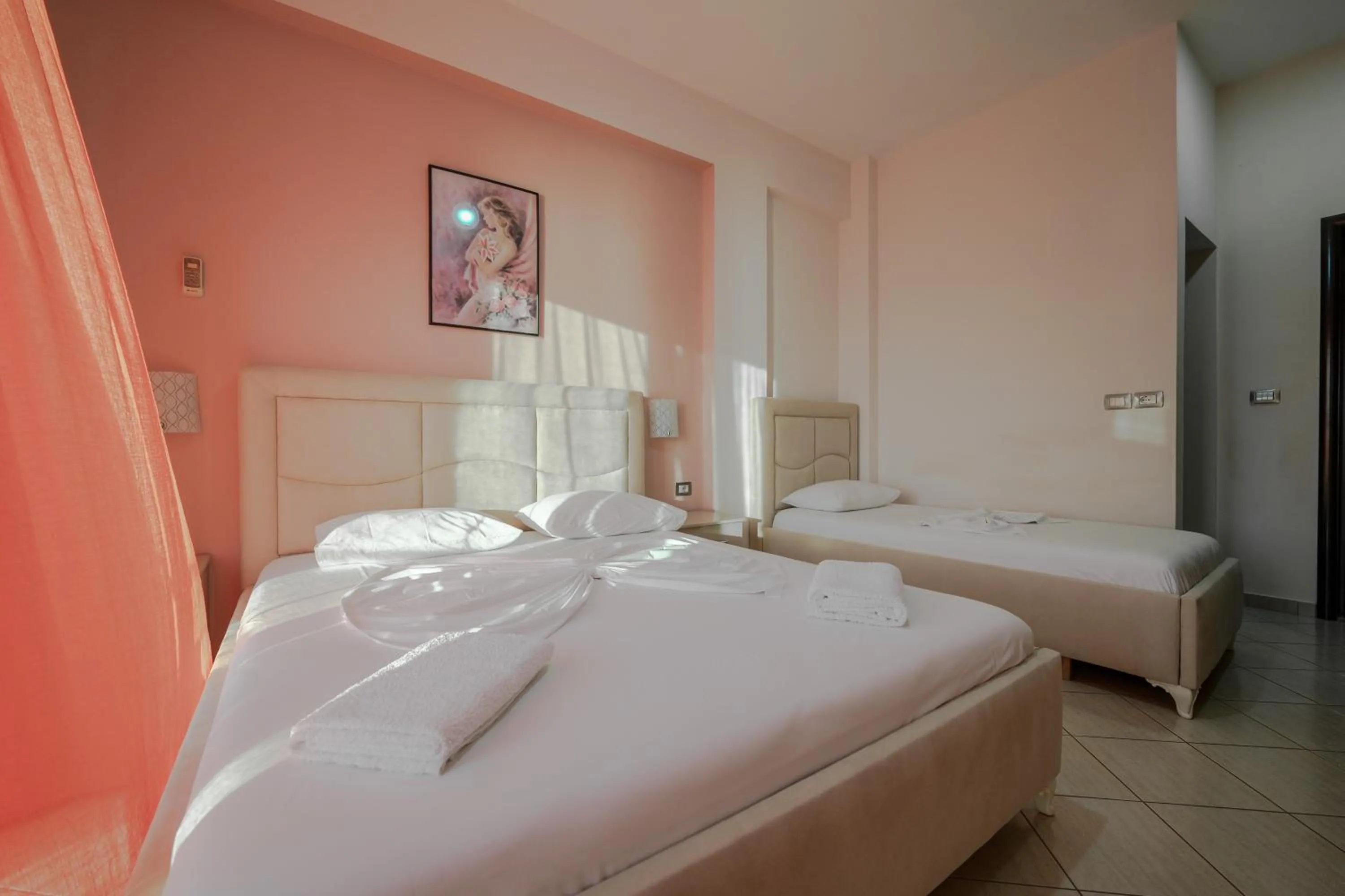 Bed in Unico ApartHotel