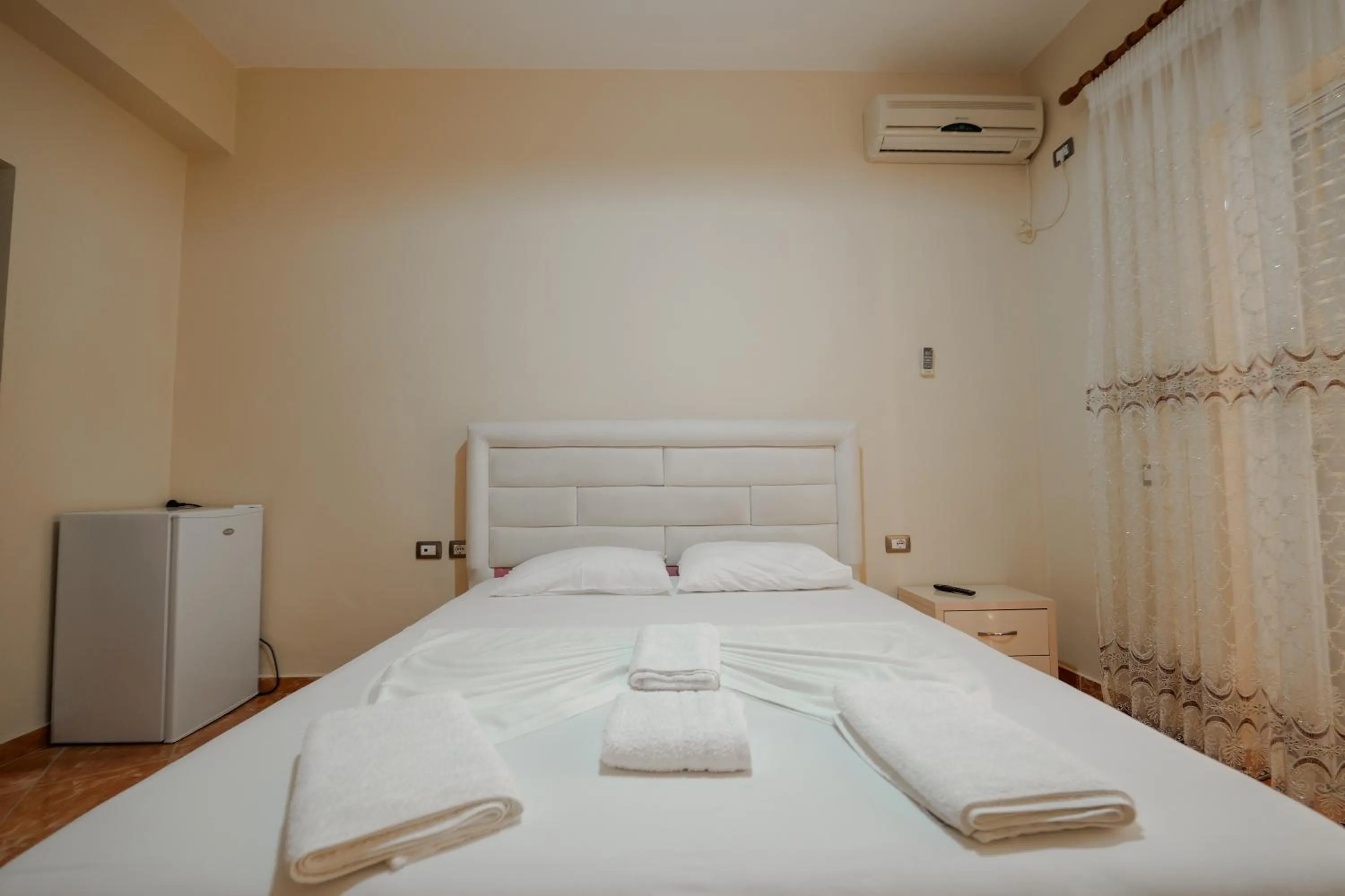 Bed in Unico ApartHotel