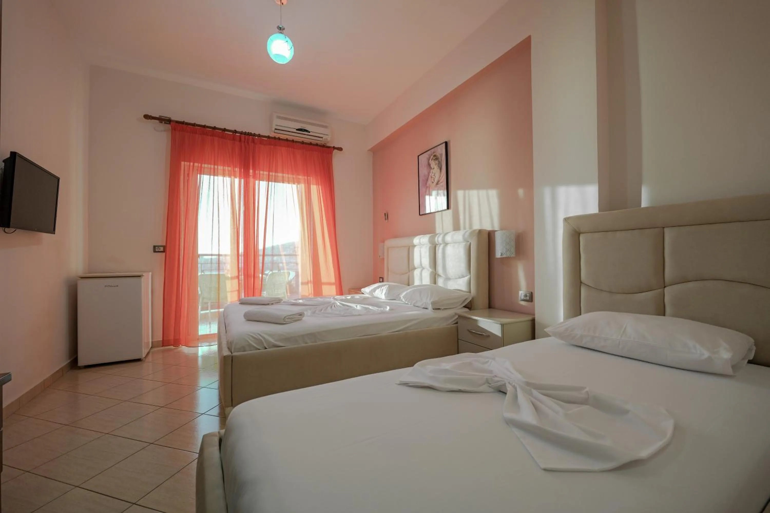 Bed in Unico ApartHotel