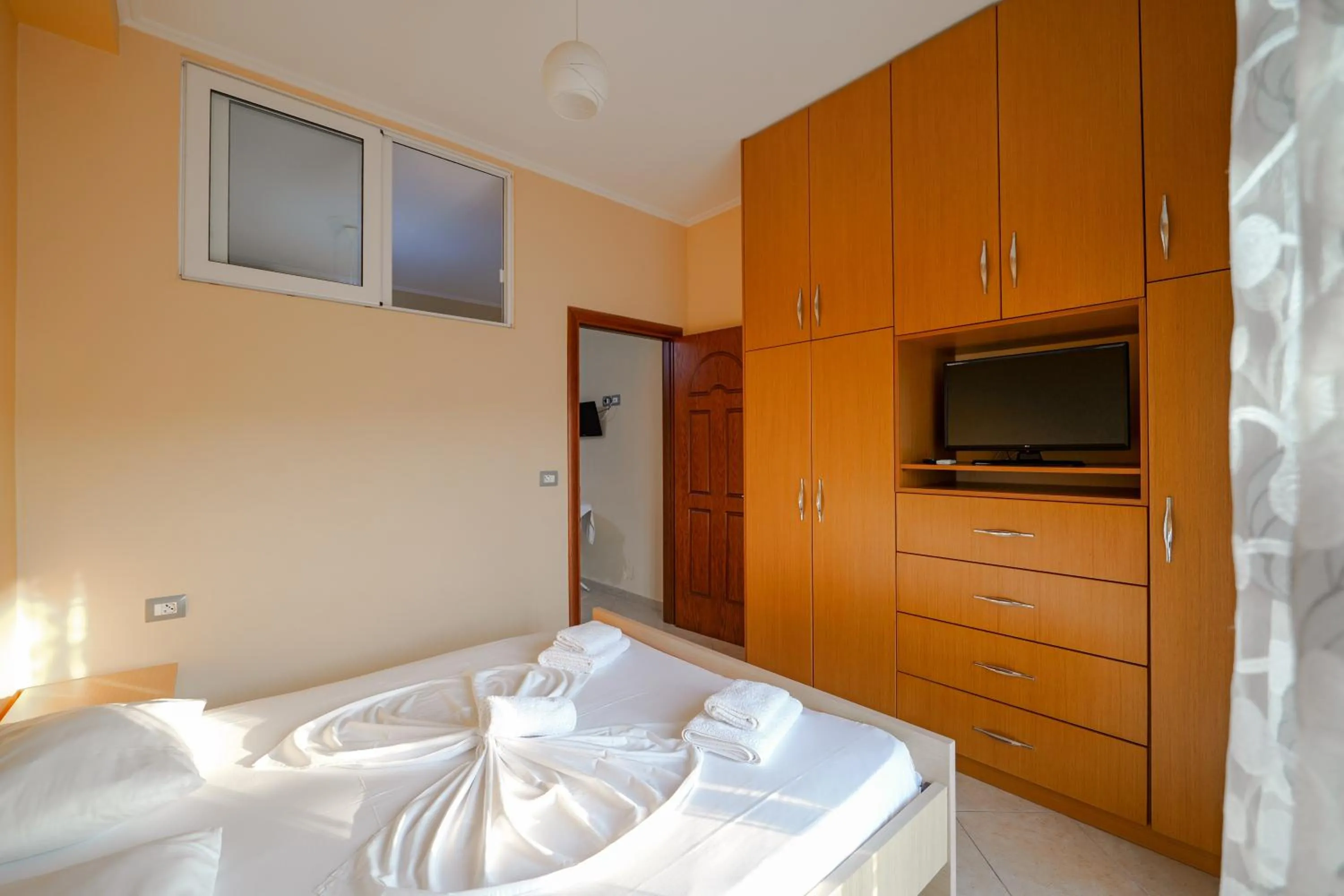 Bed in Unico ApartHotel