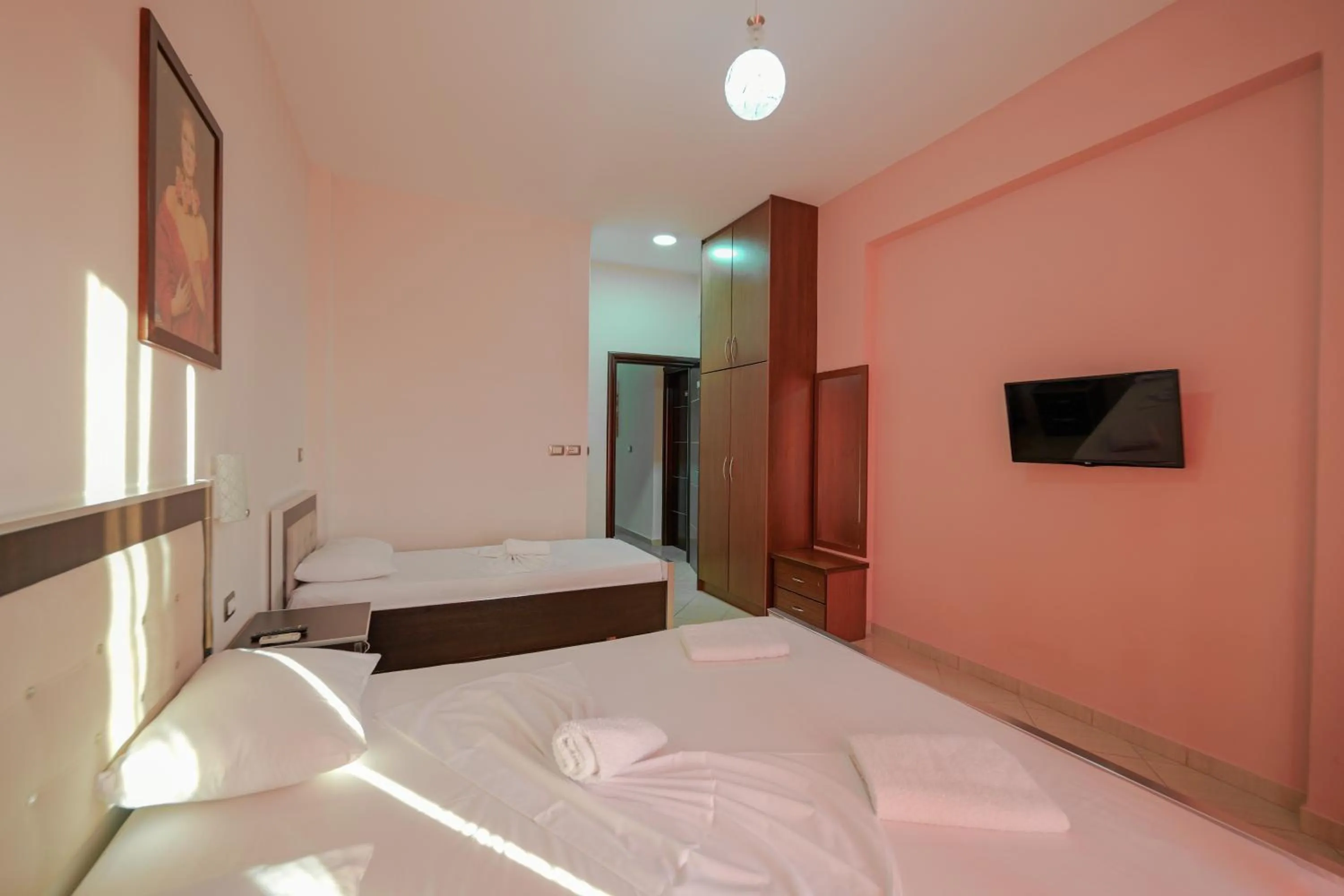 Bed in Unico ApartHotel