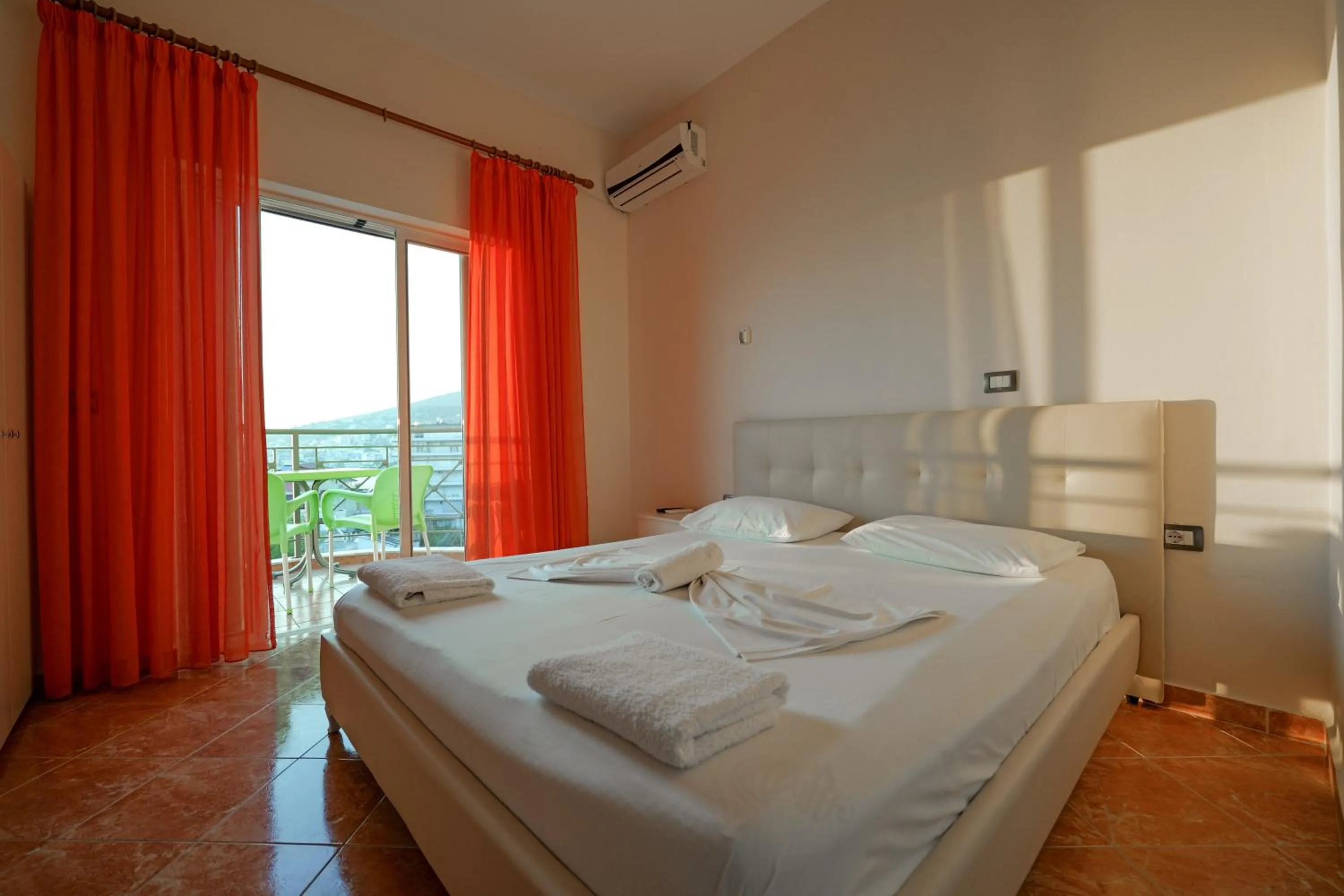 Bed in Unico ApartHotel