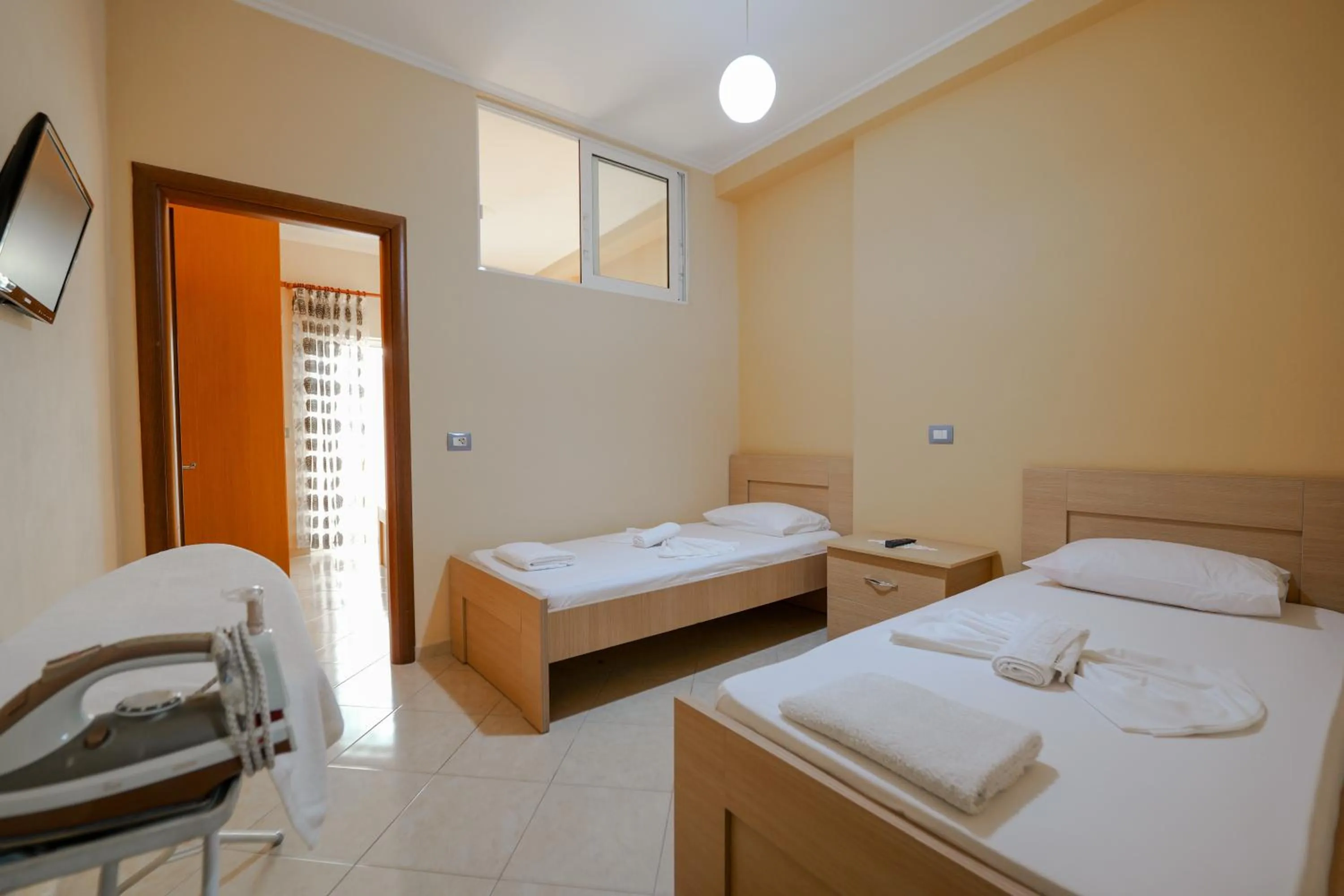 Bed in Unico ApartHotel