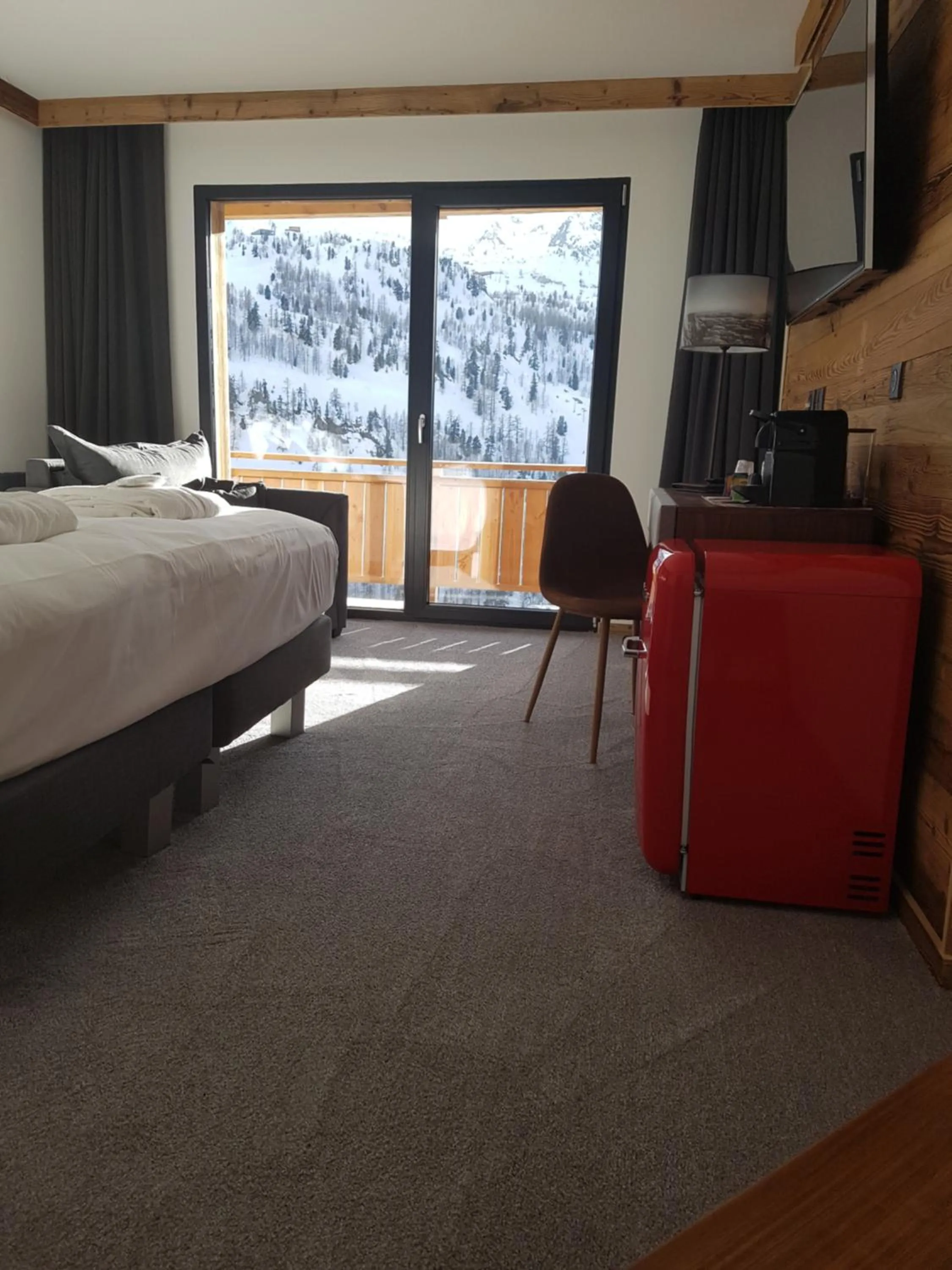Bed in Chalet Marano Restaurant & Spa