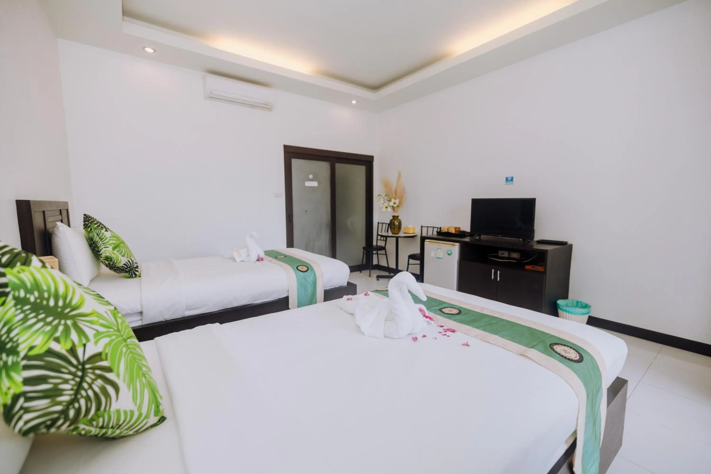 Bed in Phuket Monaburi Boutique Hotel