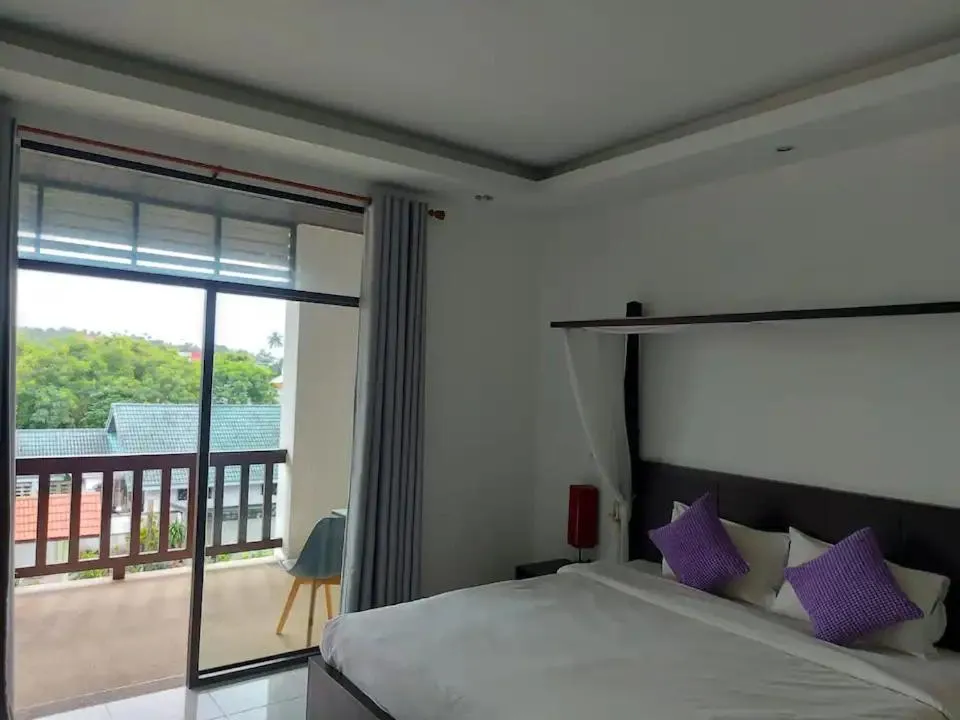 Deluxe Double Room with Balcony in Phuket Monaburi Boutique Hotel