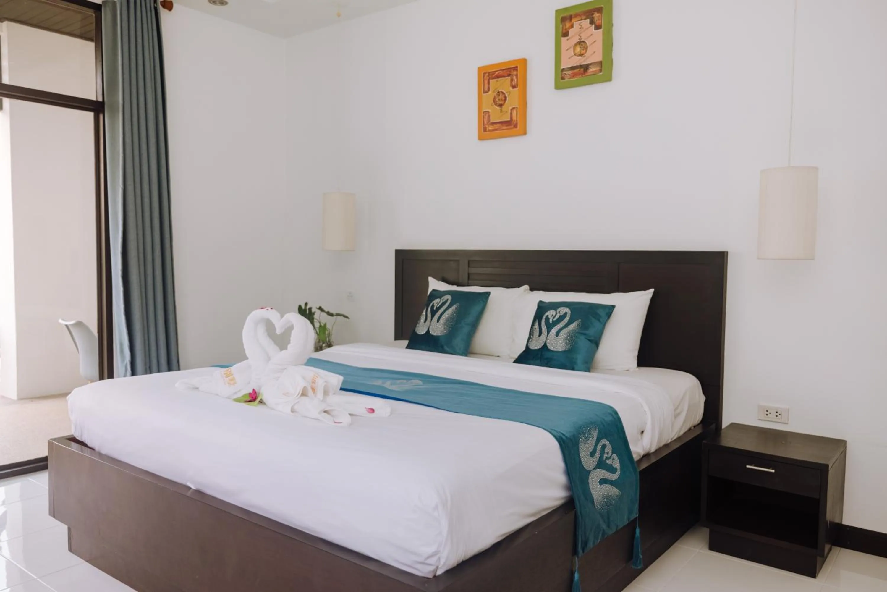 Bed in Phuket Monaburi Boutique Hotel