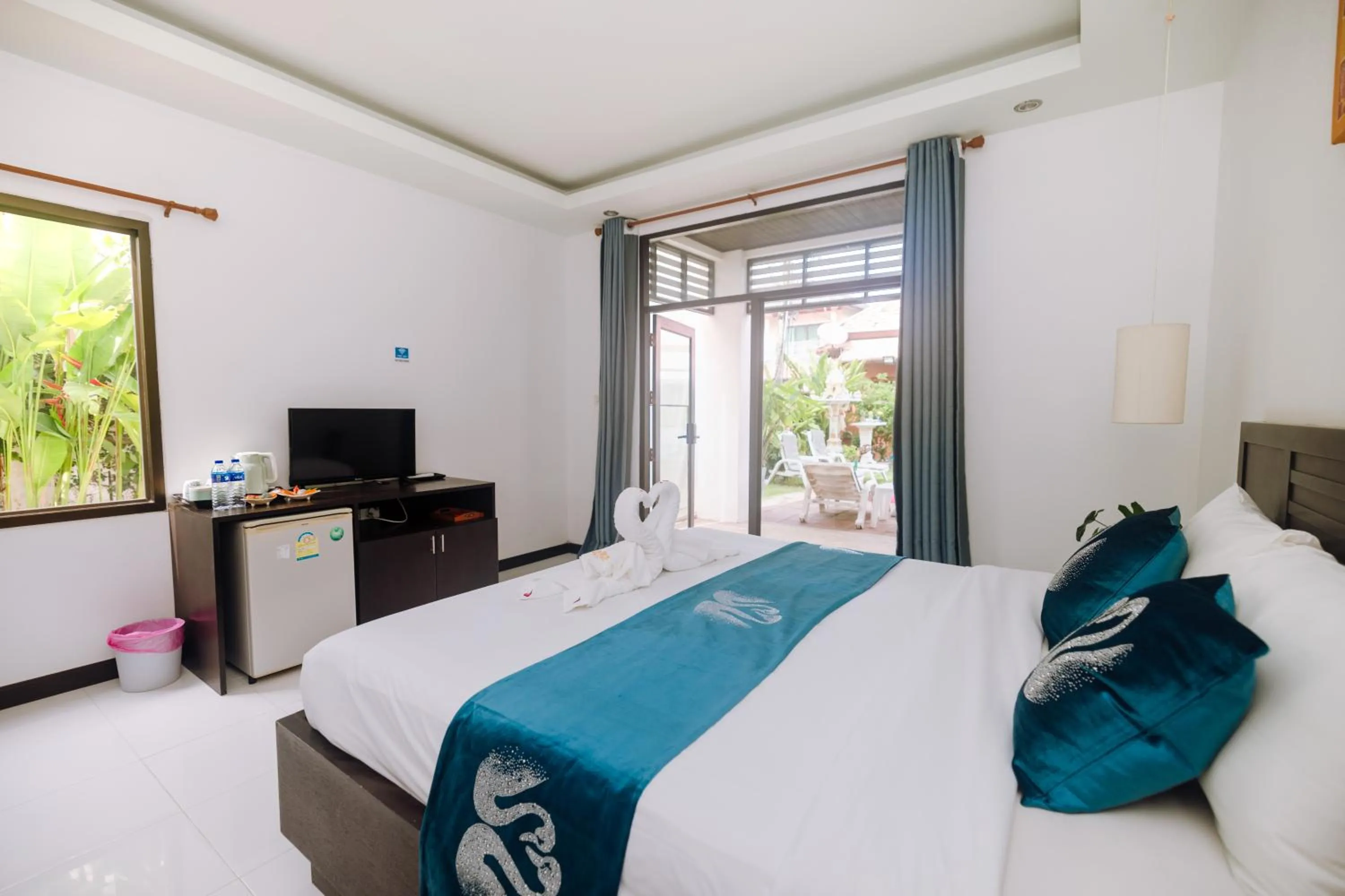 Bed in Phuket Monaburi Boutique Hotel