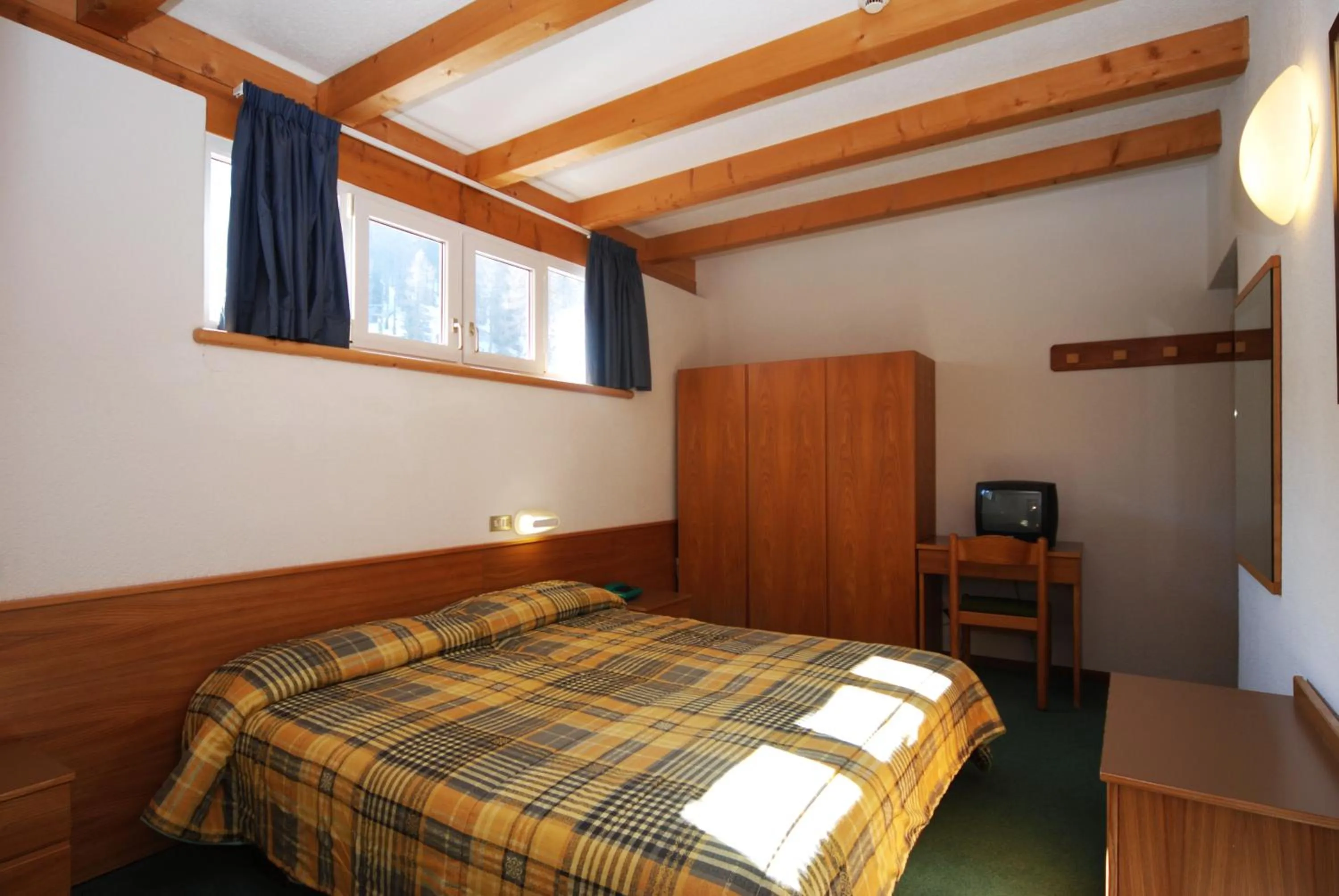 Bedroom in Sport Hotel Pampeago