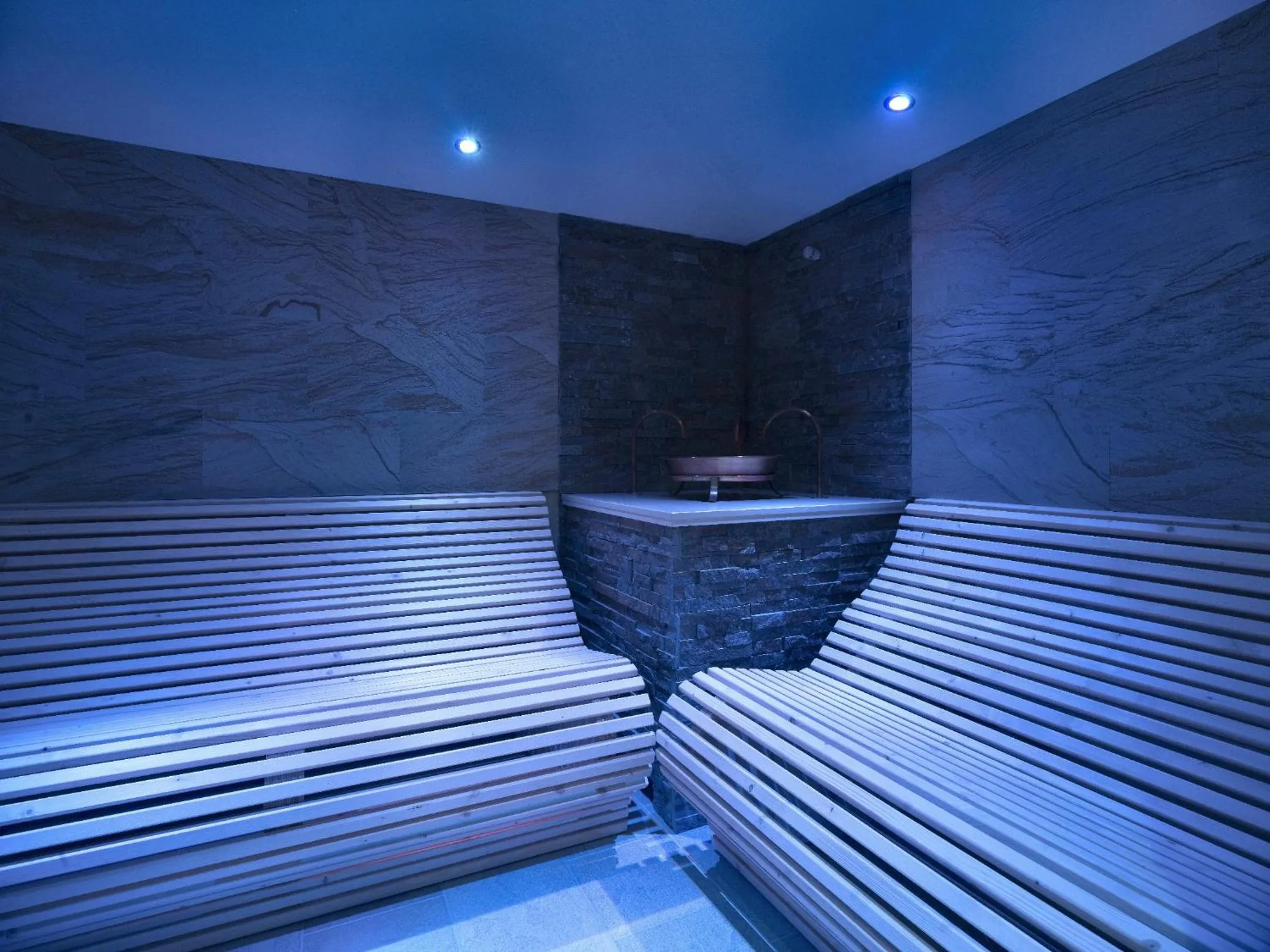 Sauna, Bed in Color Home Suite Apartments