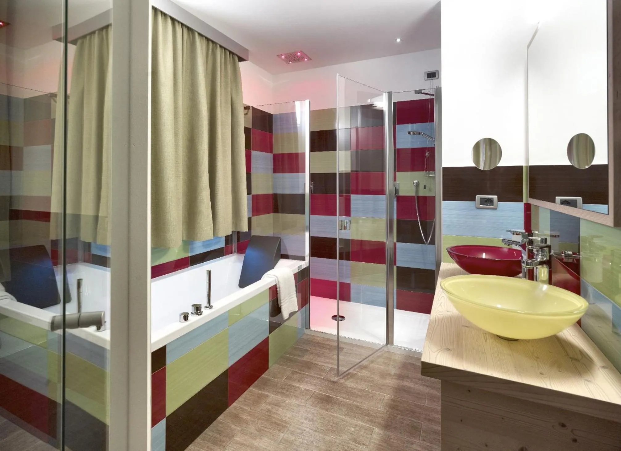 Bathroom, Bed in Color Home Suite Apartments