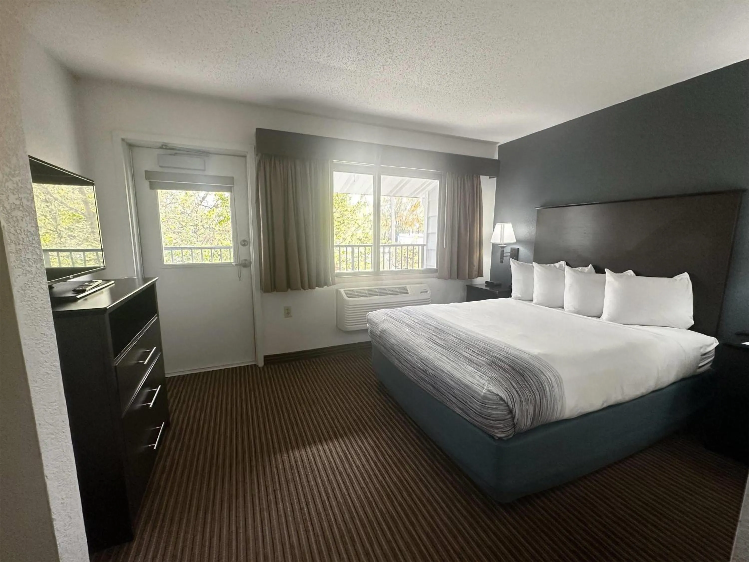 Photo of the whole room, Bed in AmericInn by Wyndham Menominee