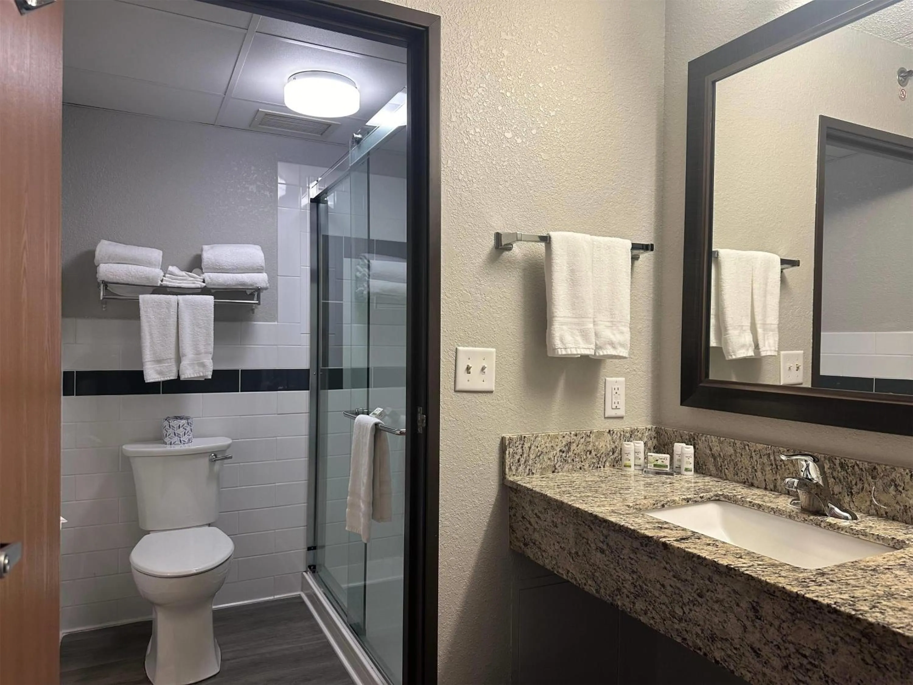 Bathroom in AmericInn by Wyndham Menominee