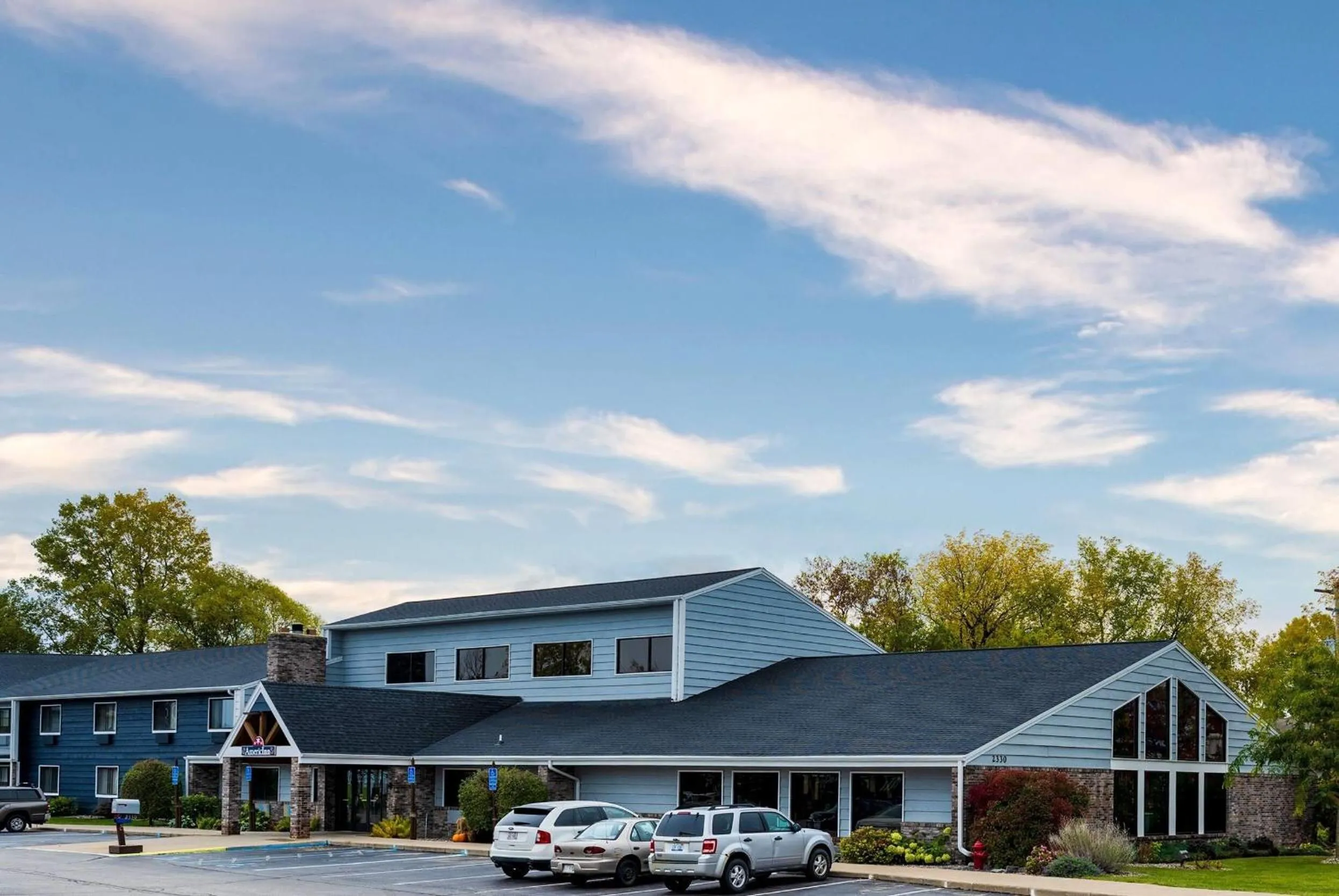 Property building in AmericInn by Wyndham Menominee