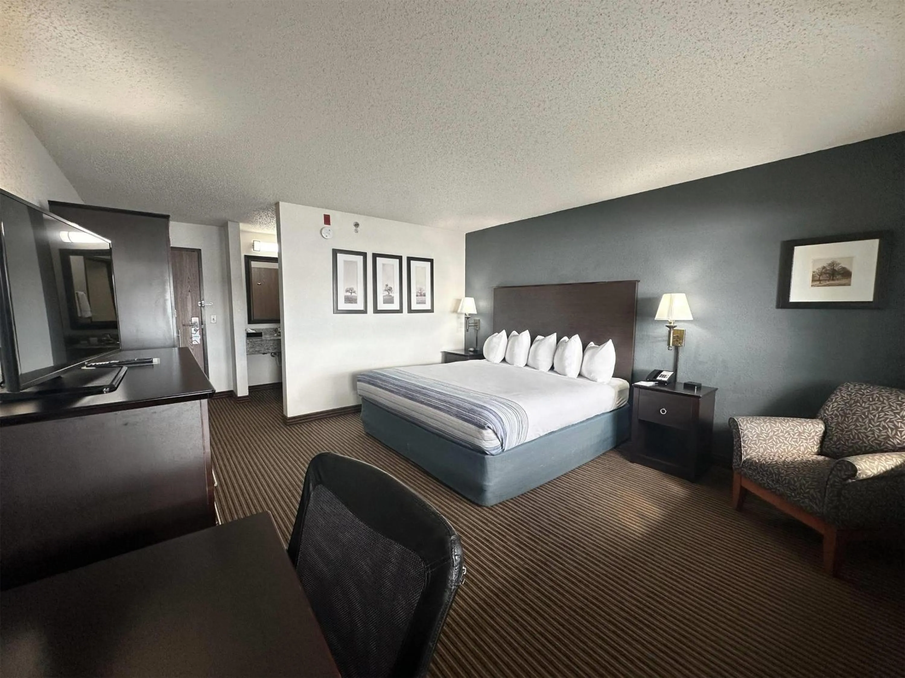 Photo of the whole room, Bed in AmericInn by Wyndham Menominee