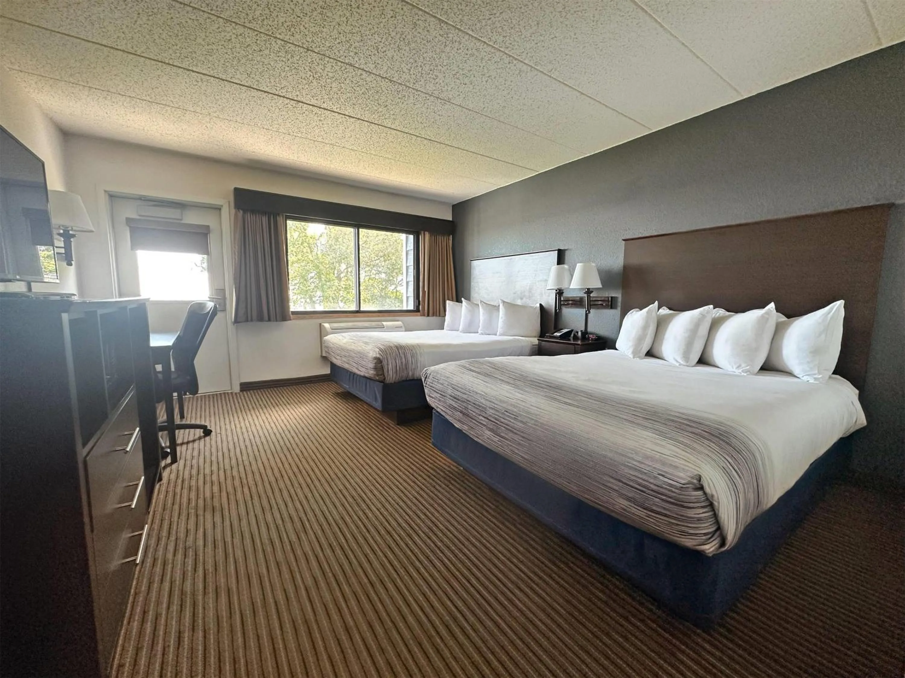 Photo of the whole room, Bed in AmericInn by Wyndham Menominee