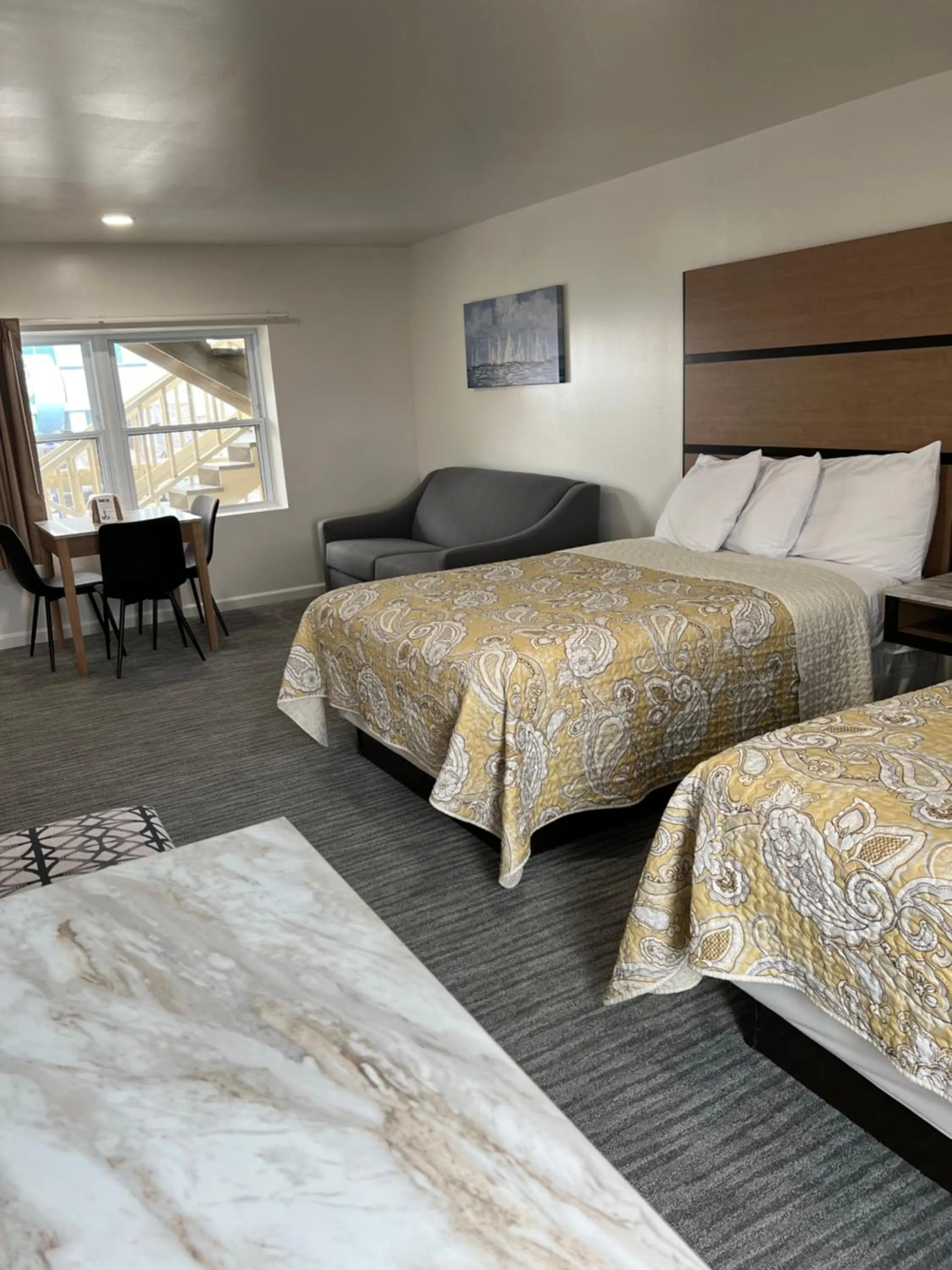 Bed in Crystal Sands Motel