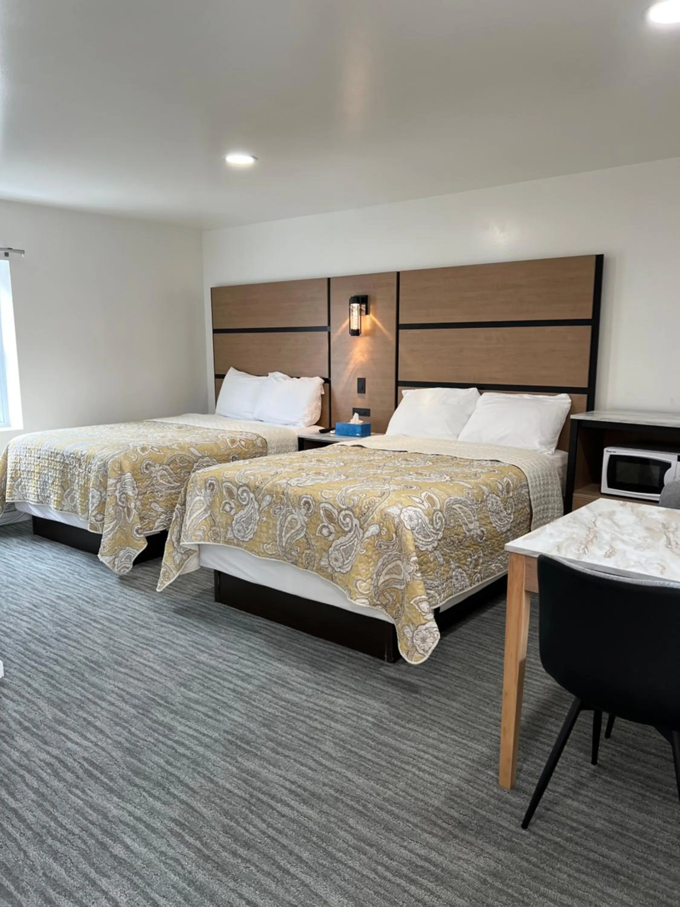 Bed in Crystal Sands Motel