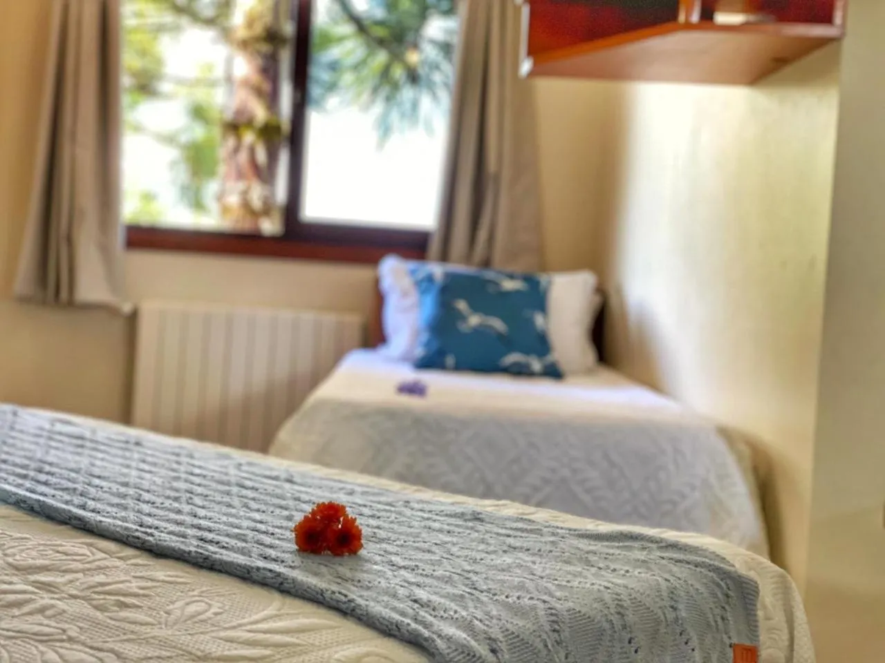 Bed in Pousada Flor De Canela