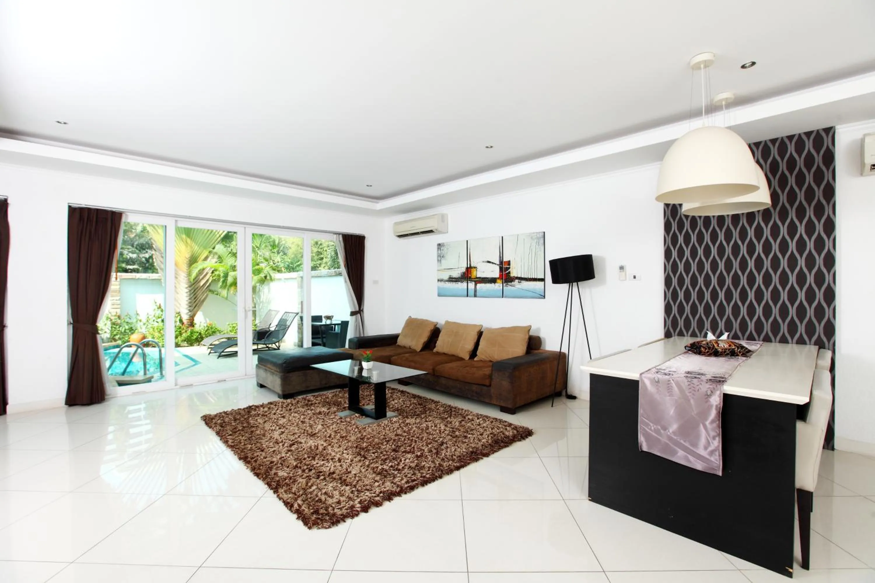 Living room in Wongamat Pool Villas By Pattaya Sunny Rentals