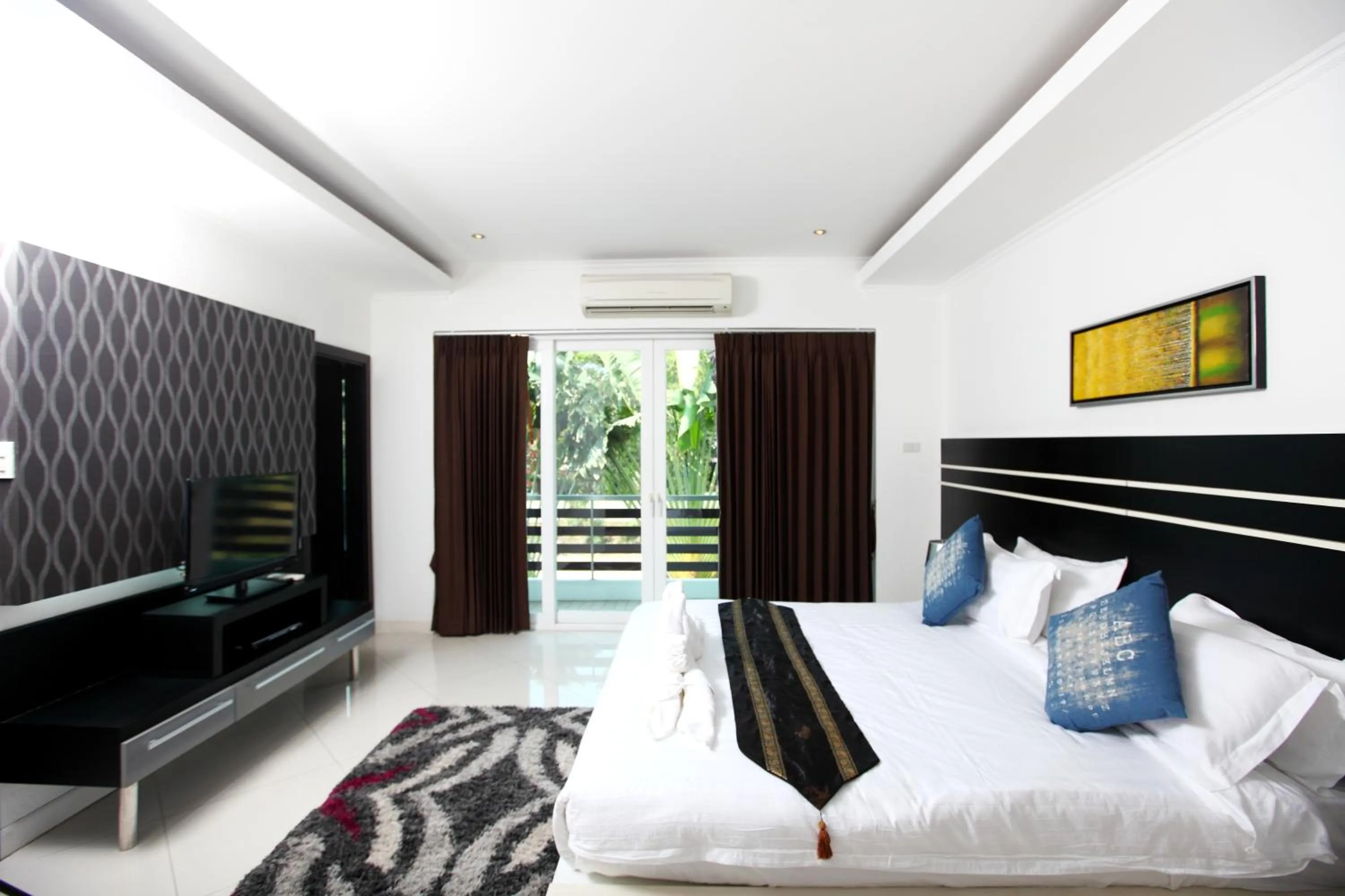 Bedroom in Wongamat Pool Villas By Pattaya Sunny Rentals