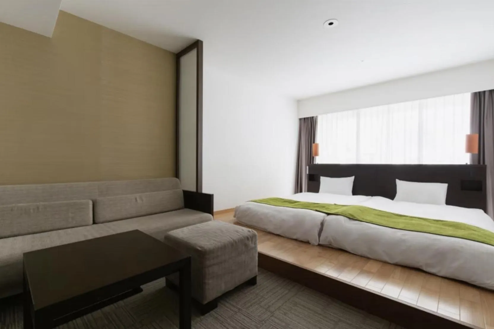 Bed in EM Wellness Kurashinohakko Lifestyle Resort