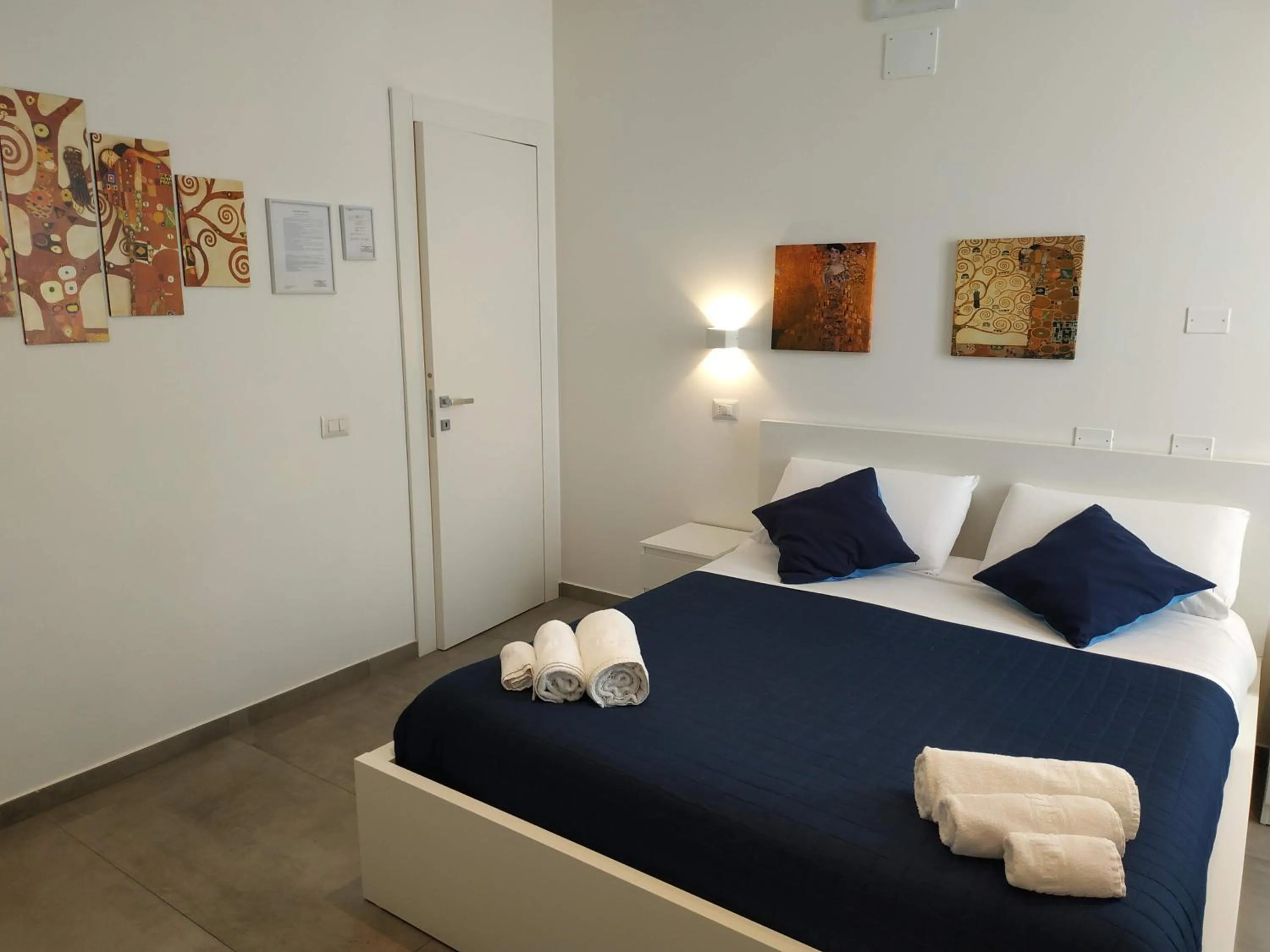 Bed in Palazzo Verdi Holiday Viterbo