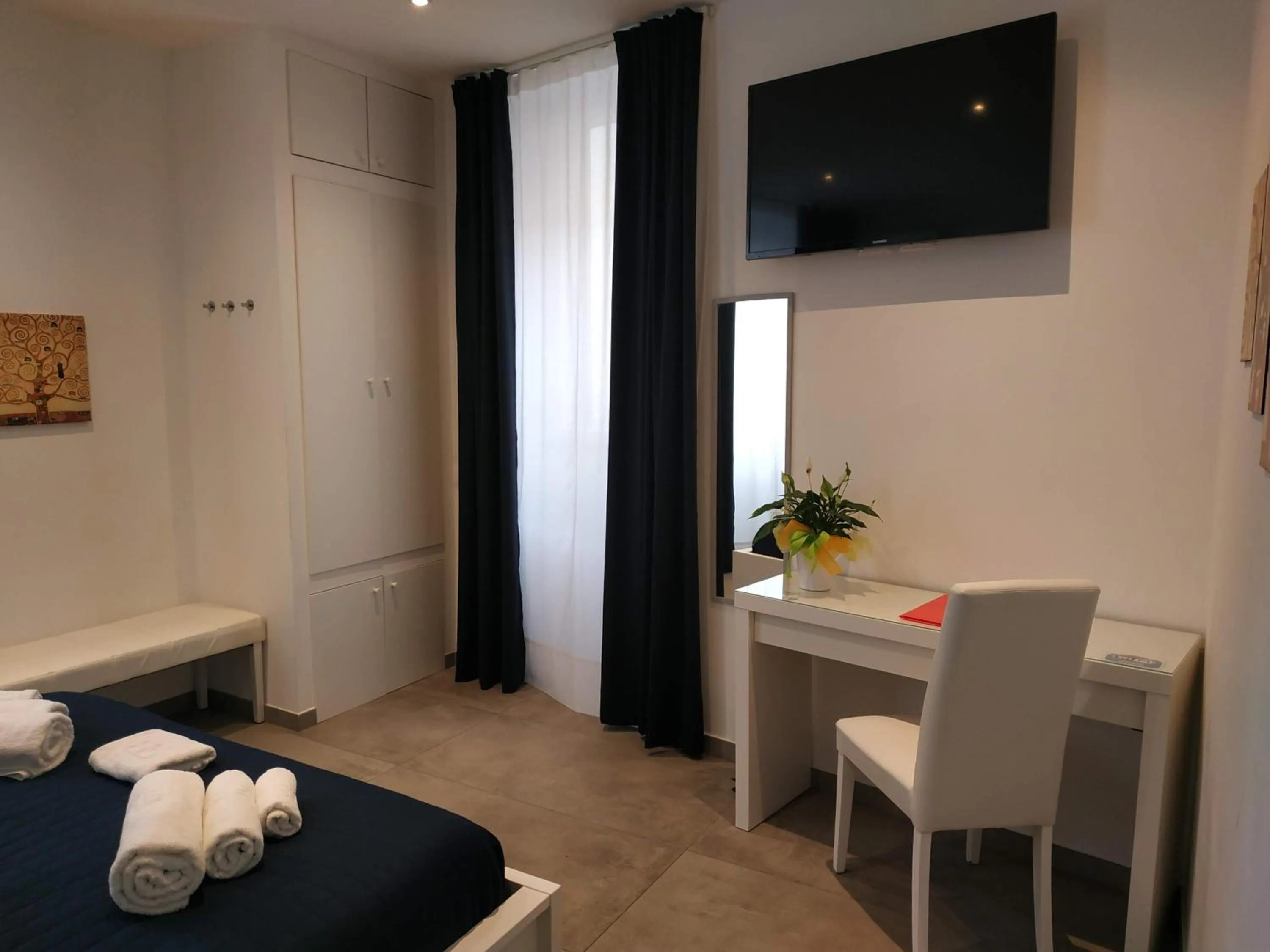 Bed in Palazzo Verdi Holiday Viterbo