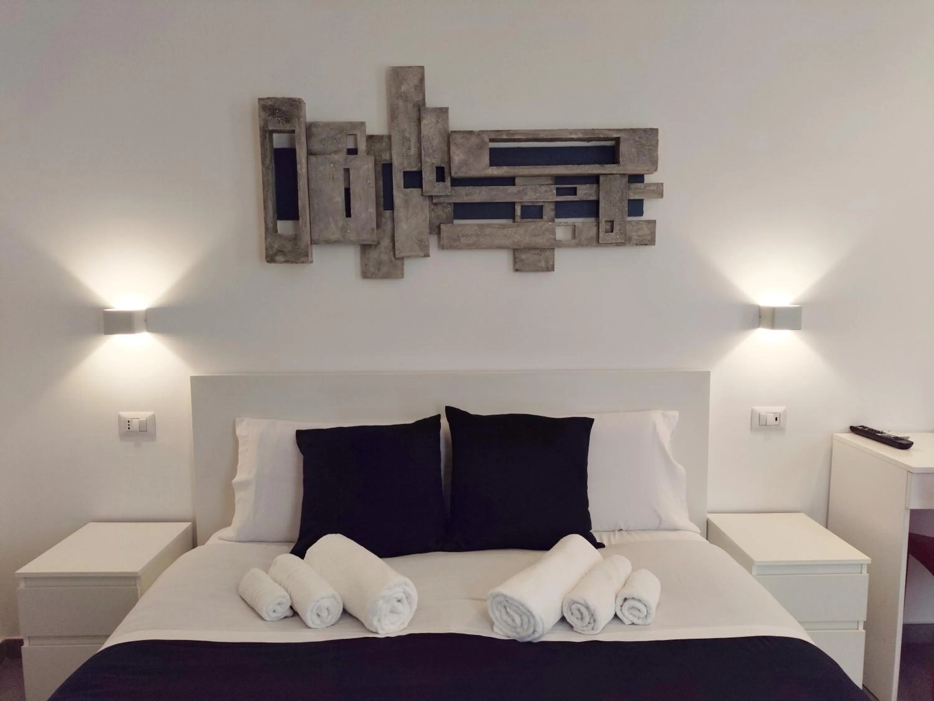 Bed in Palazzo Verdi Holiday Viterbo