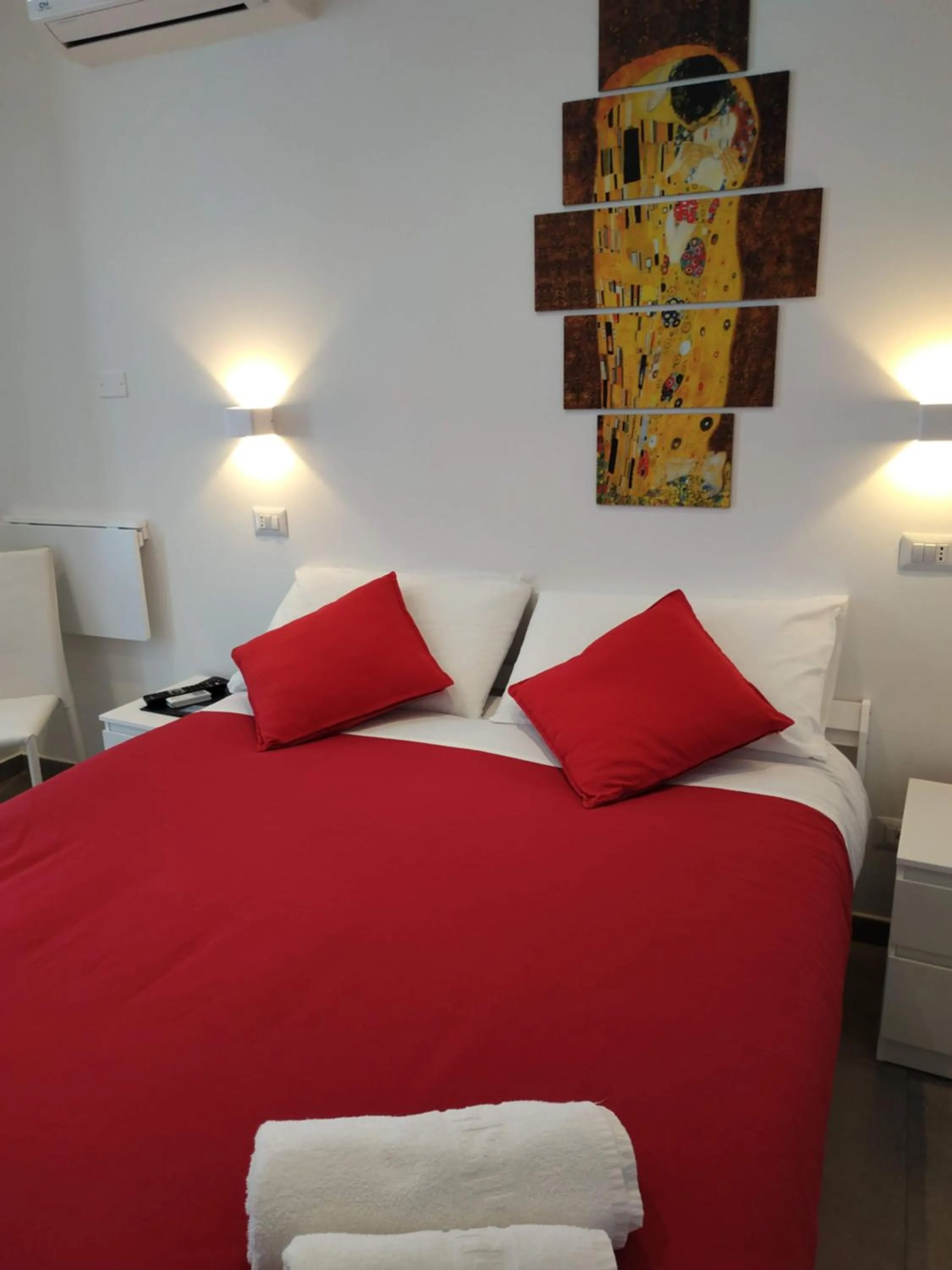 Bed in Palazzo Verdi Holiday Viterbo